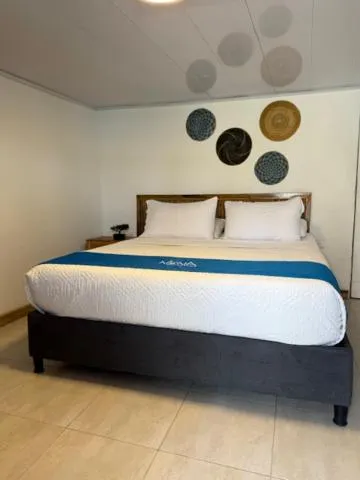 Bed in NENA BEACH CLUB & HOTEL