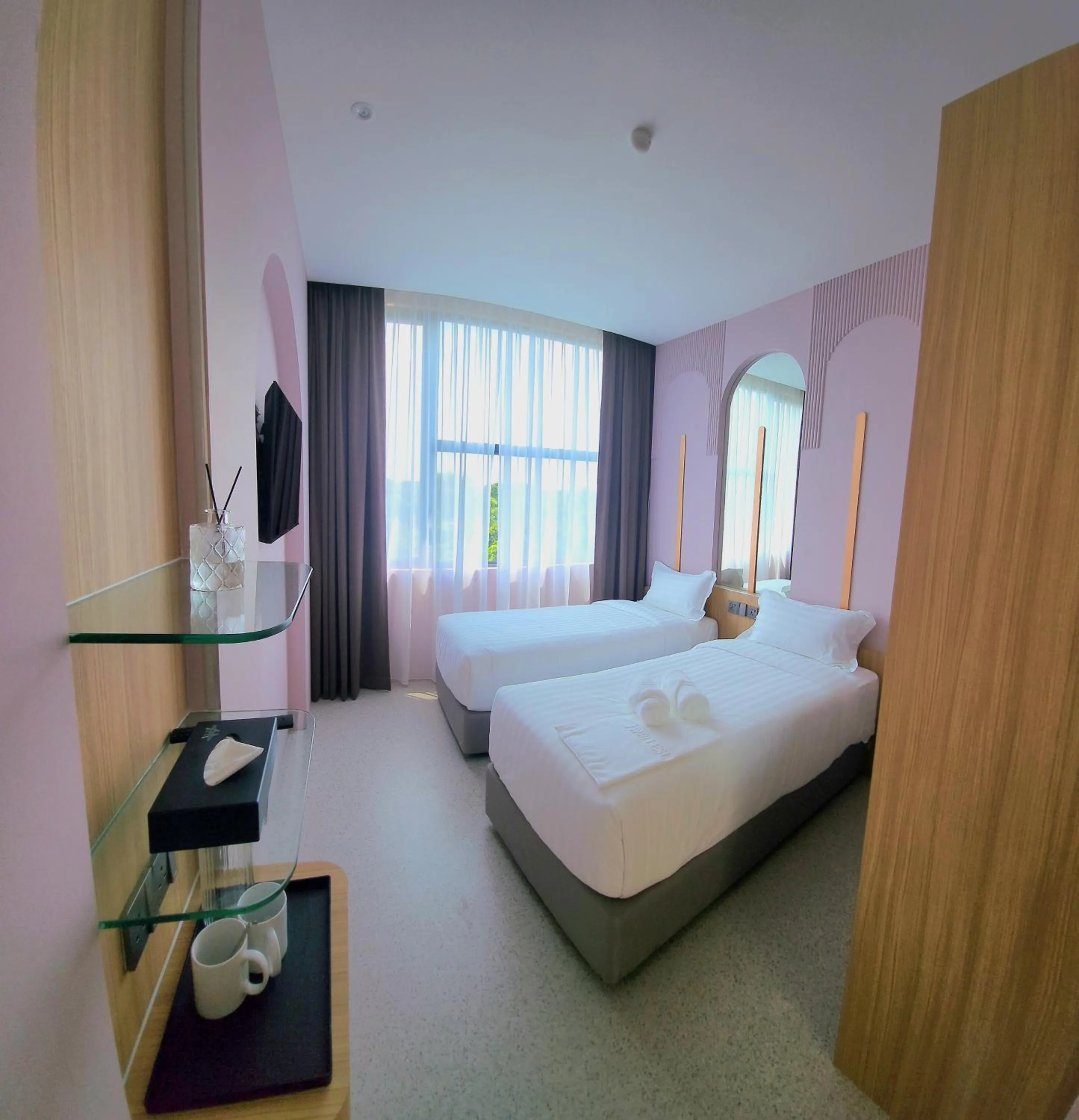 Bed in Wellesley Hotel