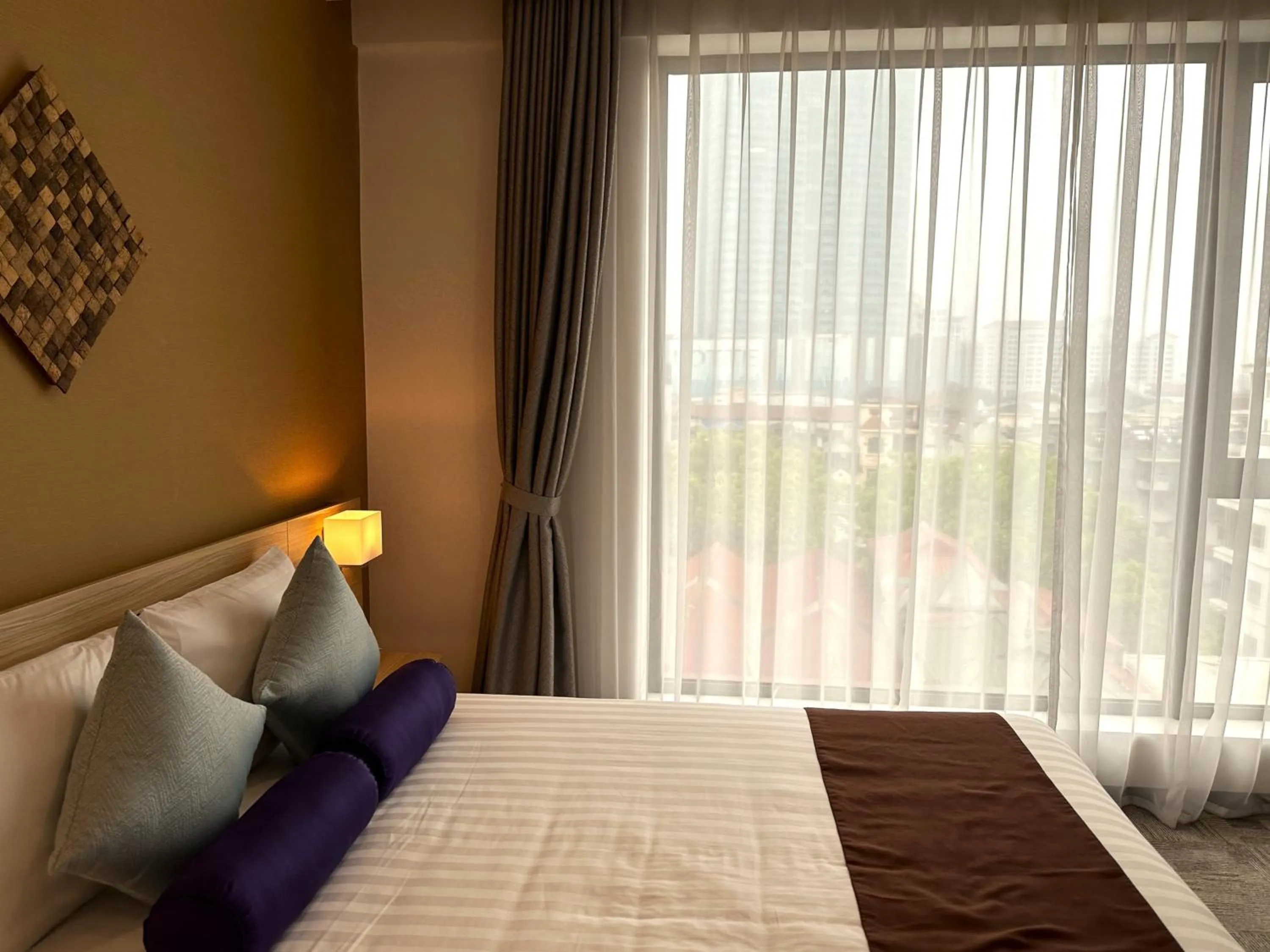 Bed in Hotel Yah Hanoi & Spa