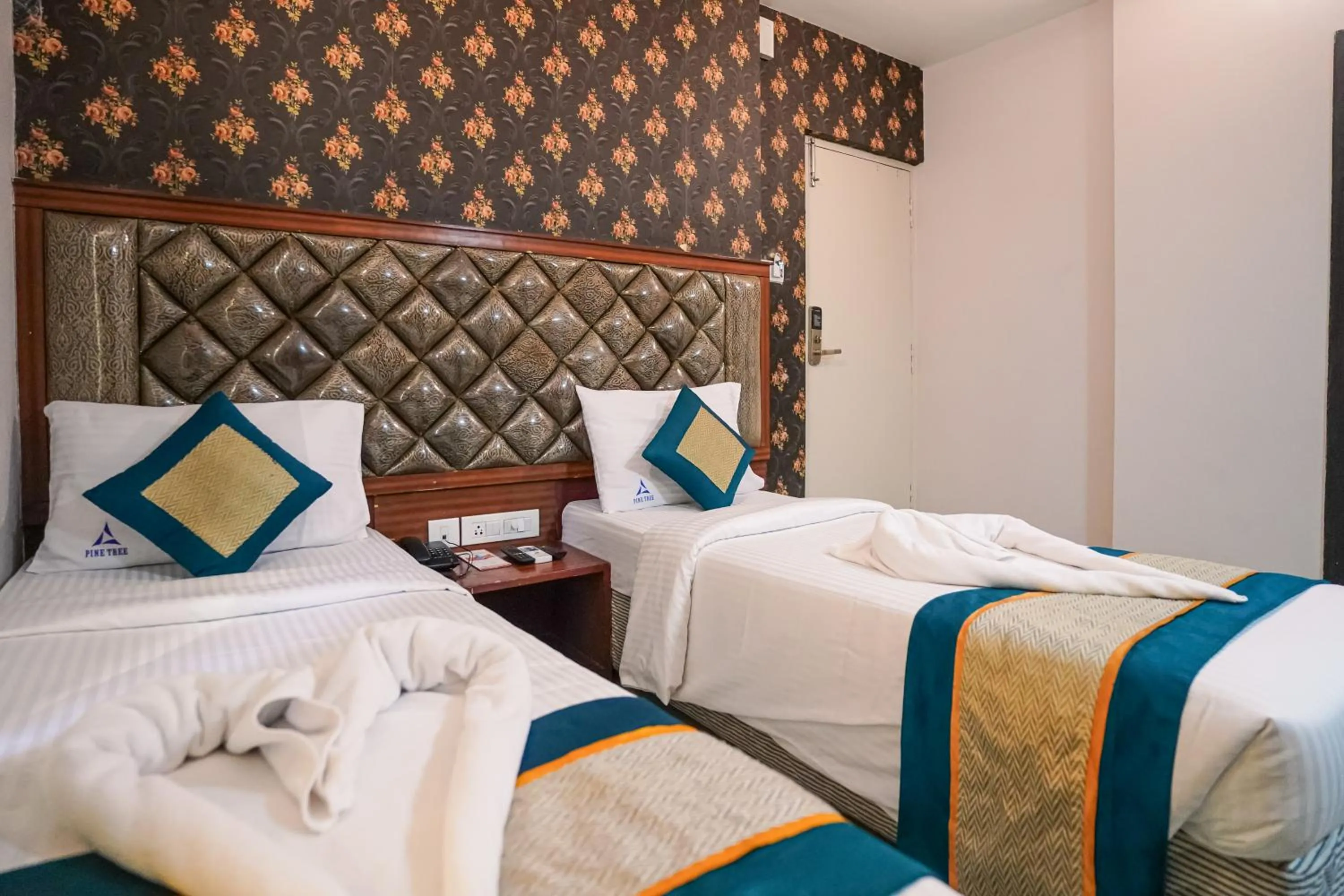 Bed in Pine Tree Boutique Hotel