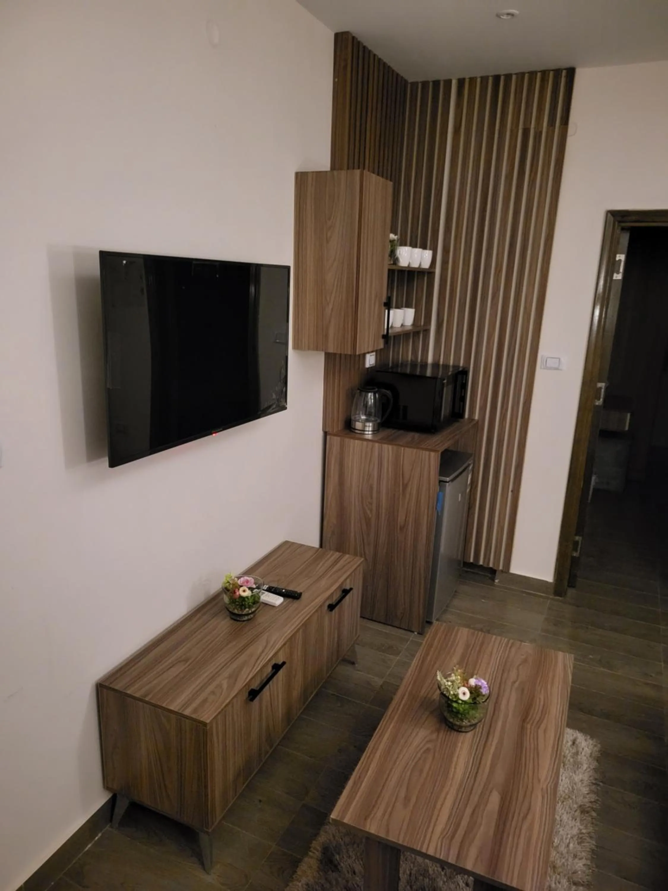 Communal lounge/ TV room in STEPS IN Pyramids View