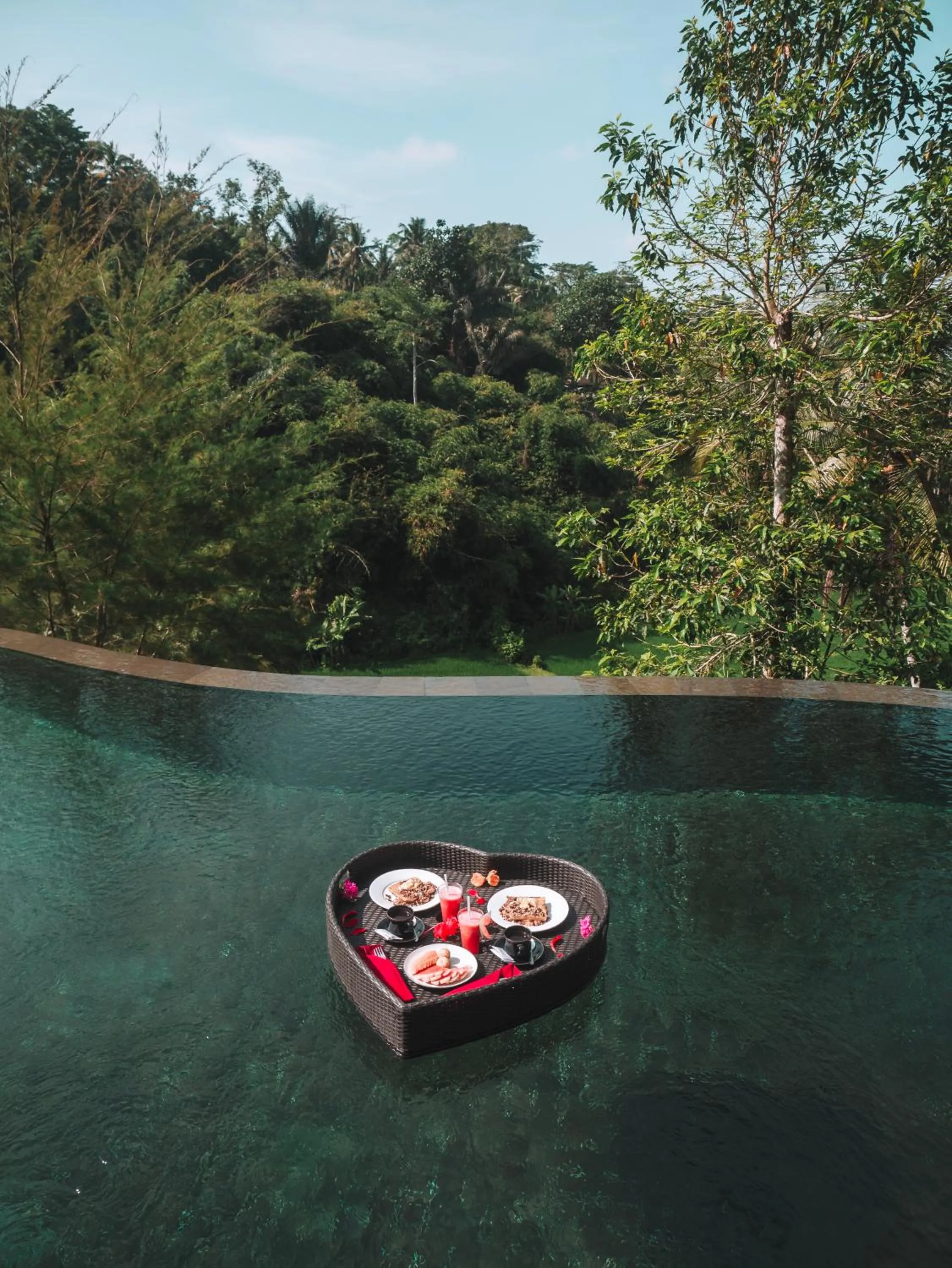 Swimming pool in The Tirta Sari Villas