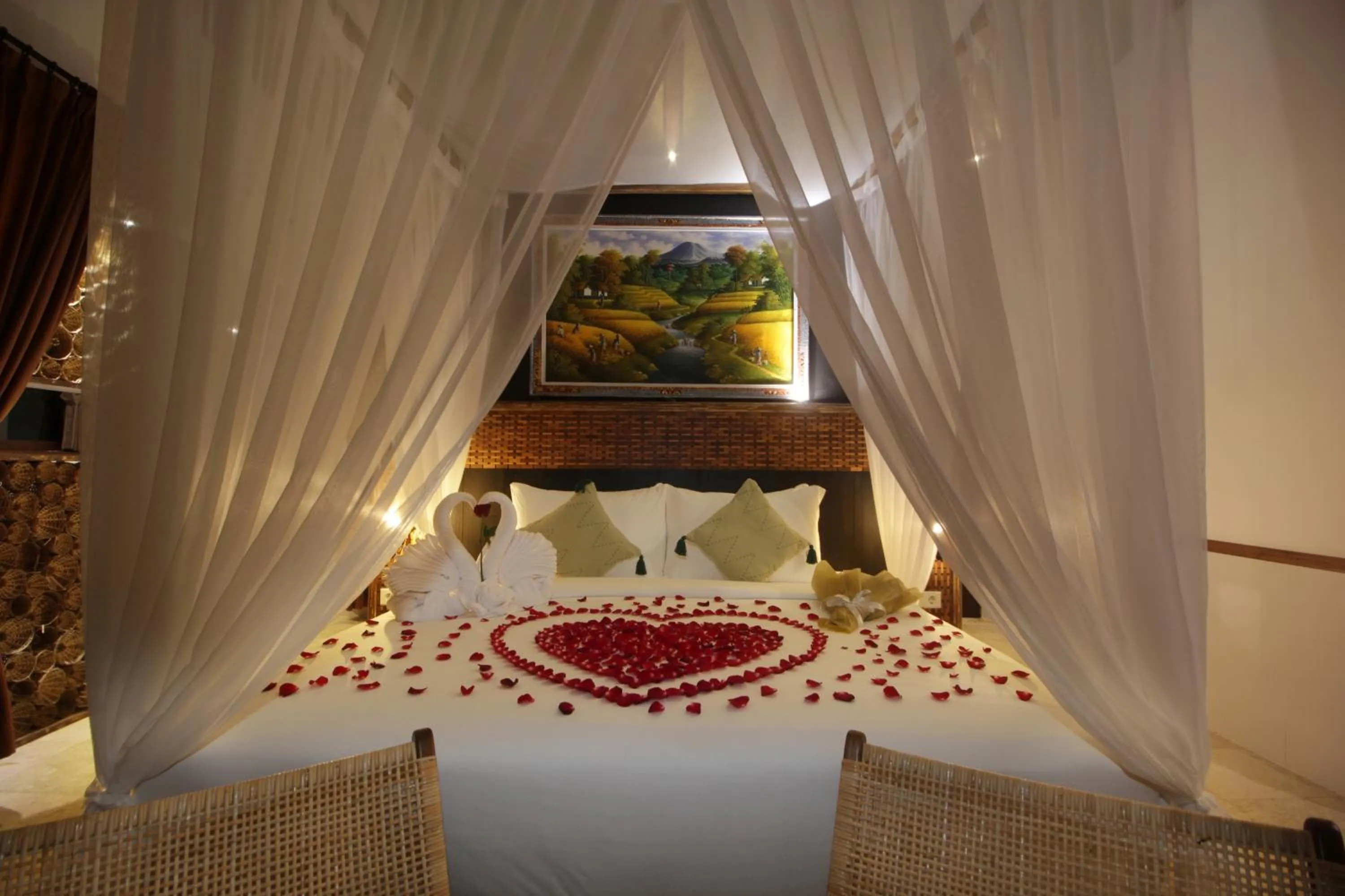Bed in The Tirta Sari Villas