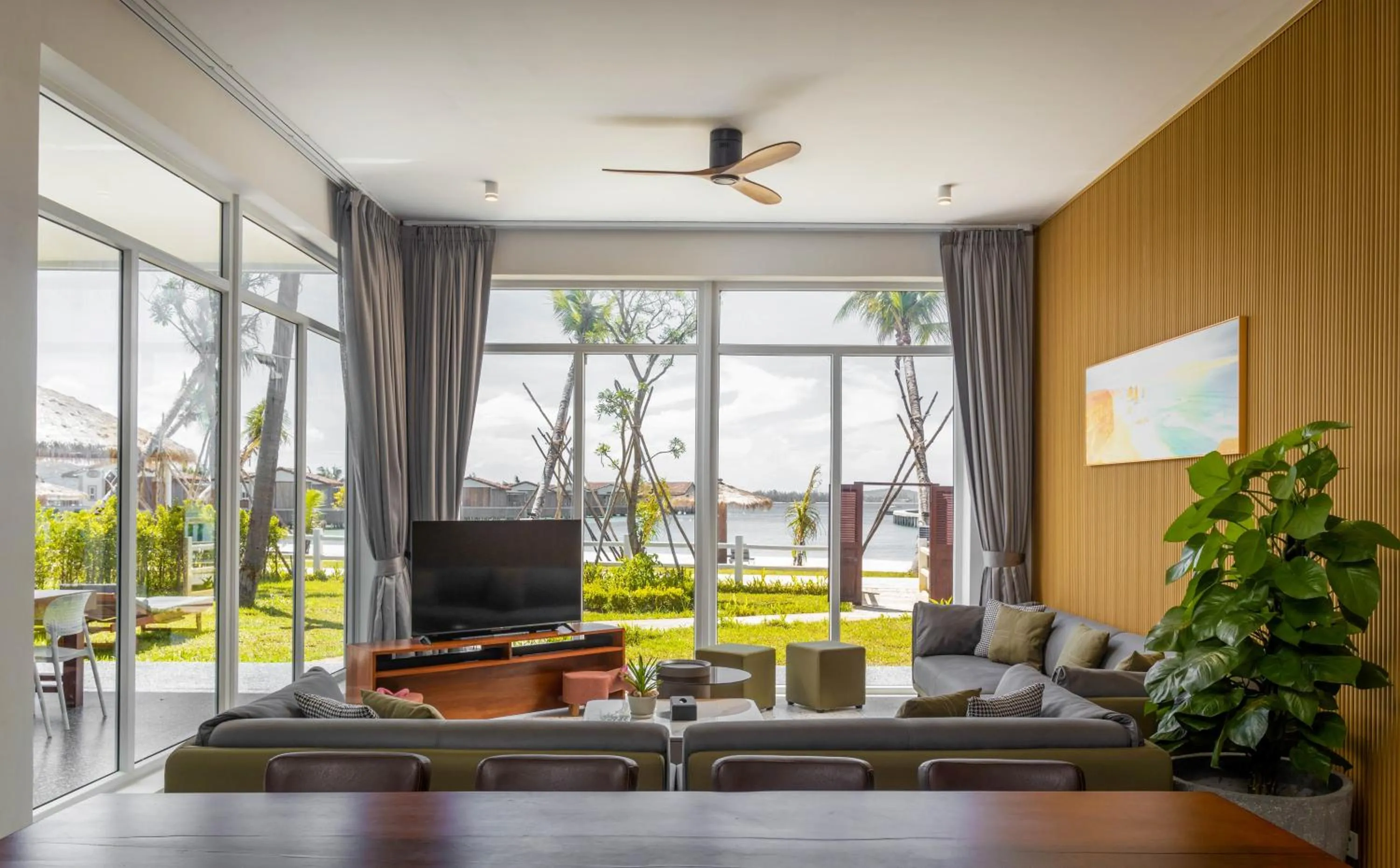 Living room in Koh Apikjun Resort by EHM