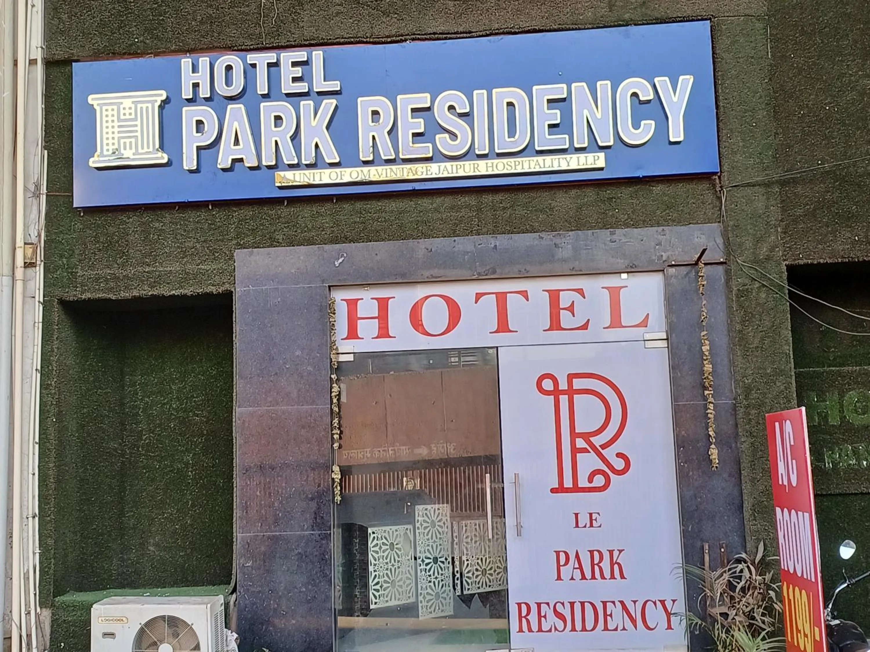 Property logo or sign in Hotel Park Residency