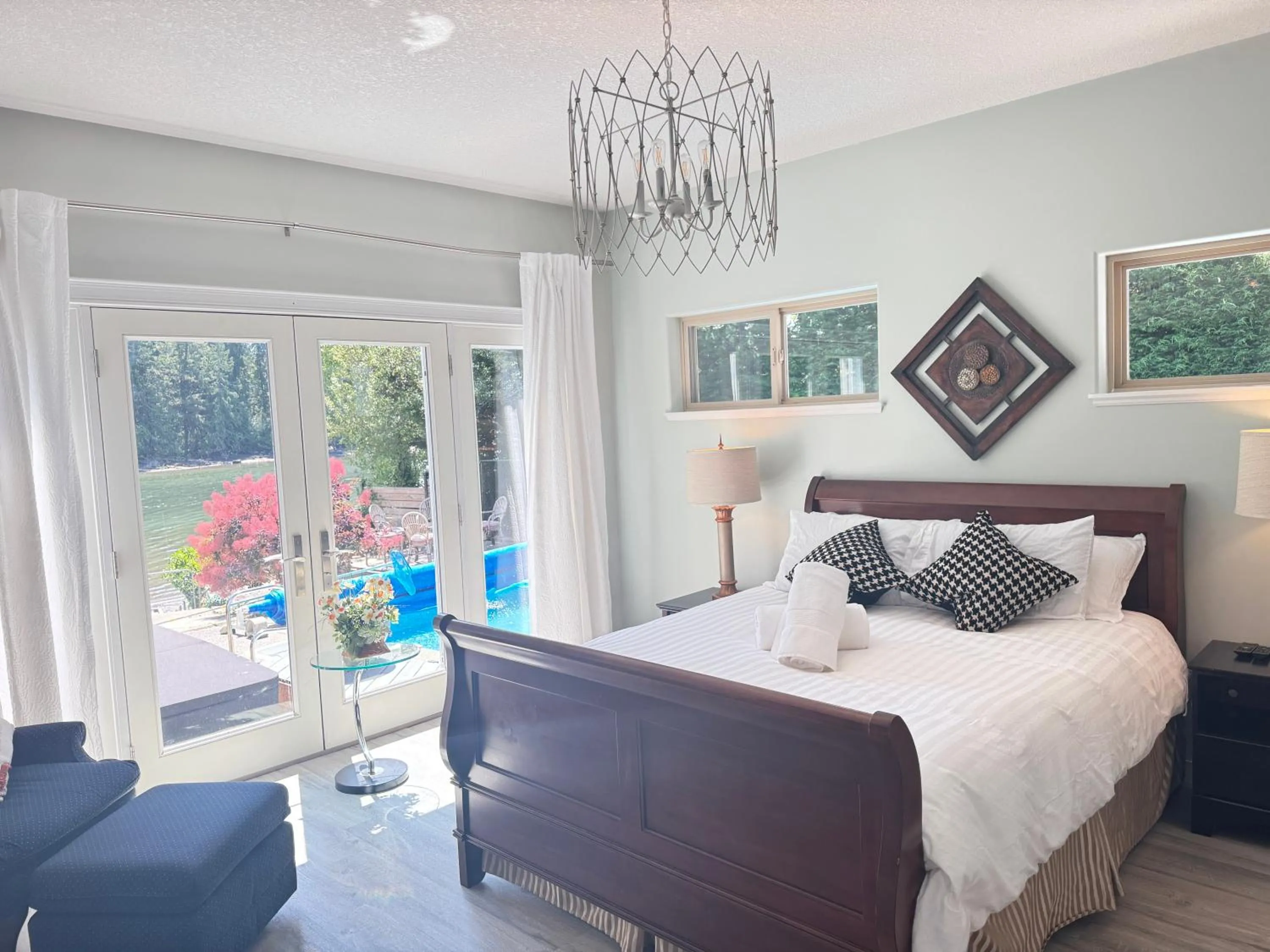 Bed in luxury ocean dock pool villa