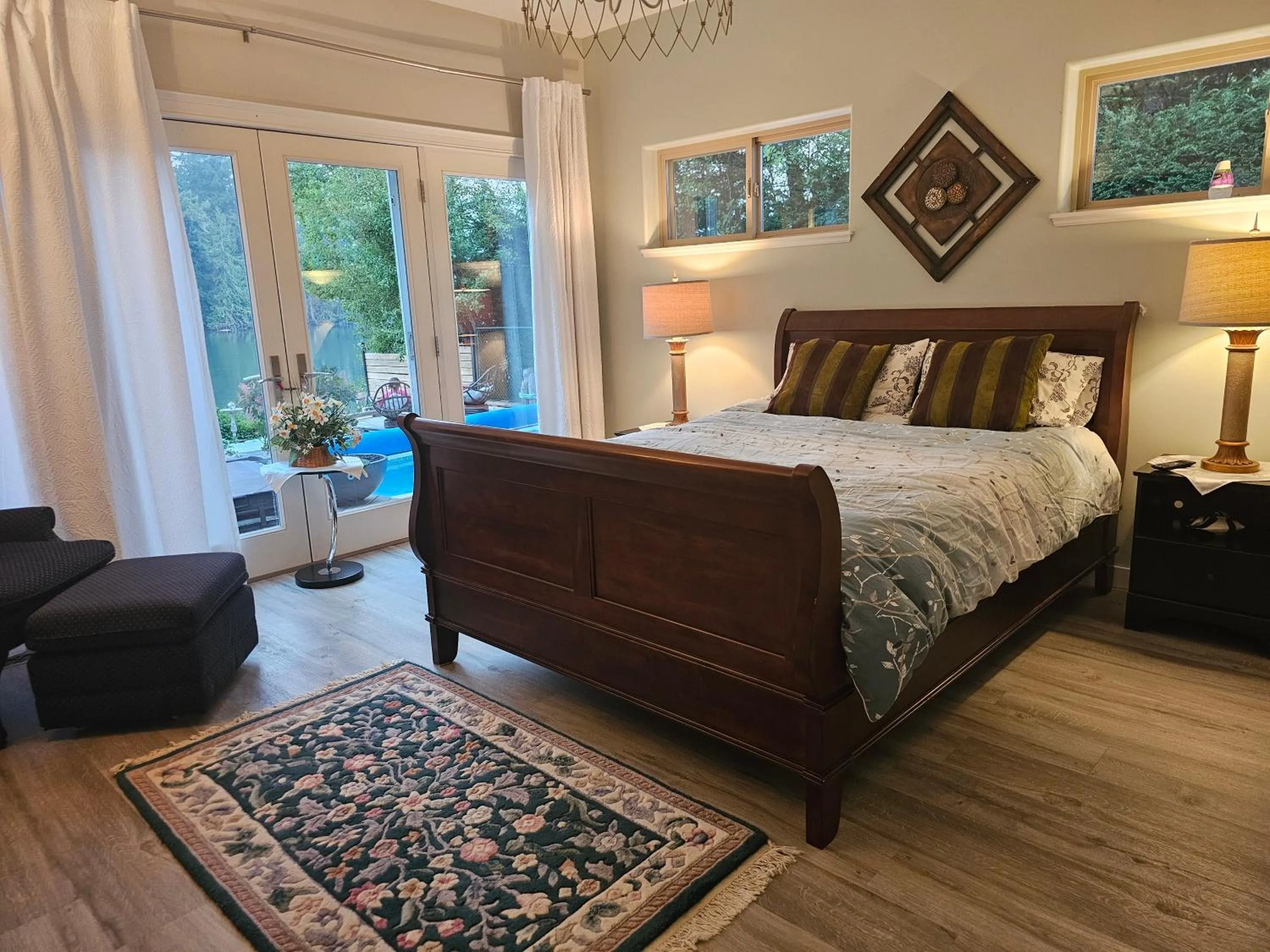 Bed in luxury ocean dock pool villa