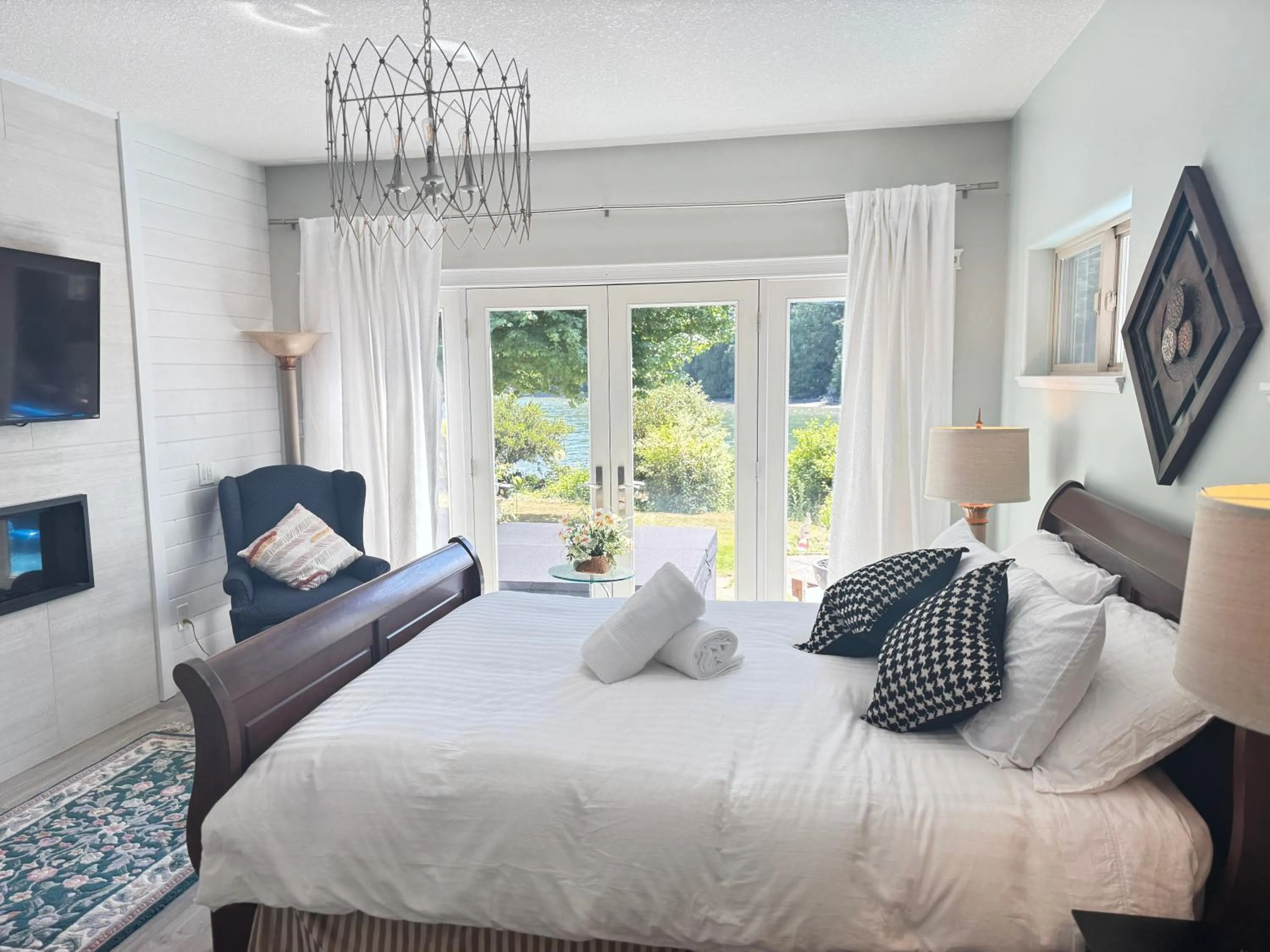 Bed in luxury ocean dock pool villa