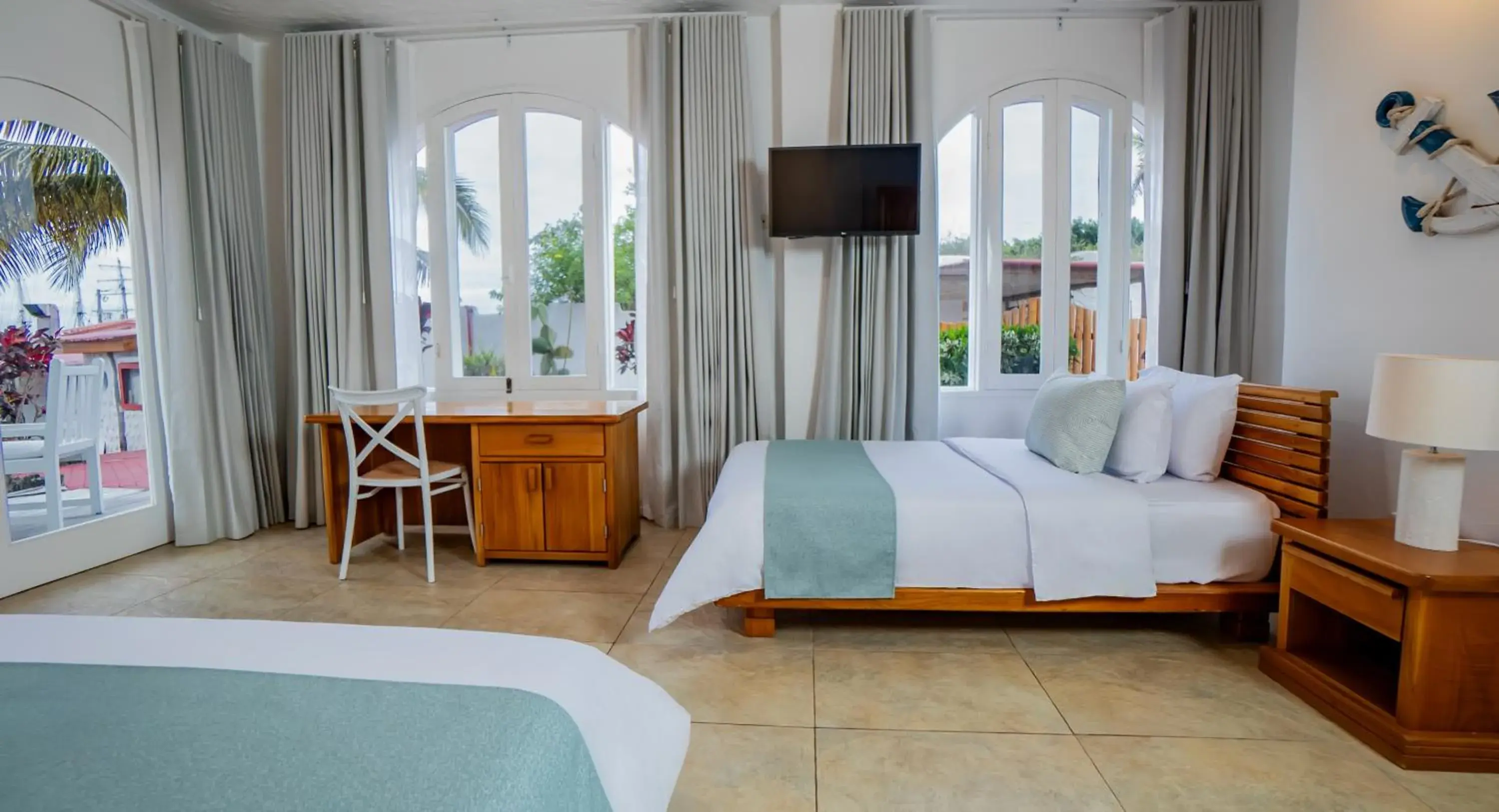 Photo of the whole room, Bed in Hotel Angermeyer Waterfront Inn Photo of the whole room, Bed in Hotel Angermeyer Waterfront Inn