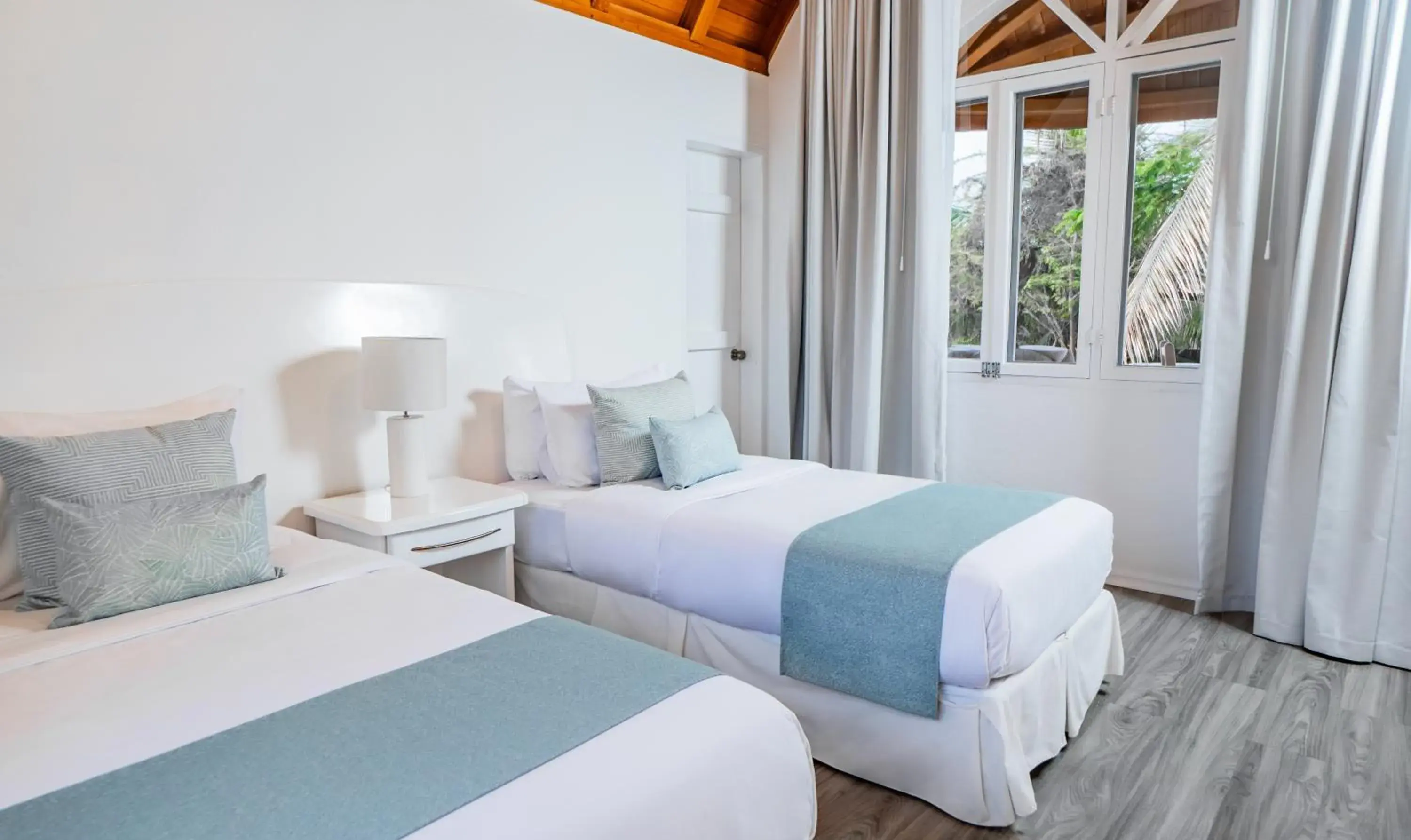 Photo of the whole room, Bed in Hotel Angermeyer Waterfront Inn Photo of the whole room, Bed in Hotel Angermeyer Waterfront Inn