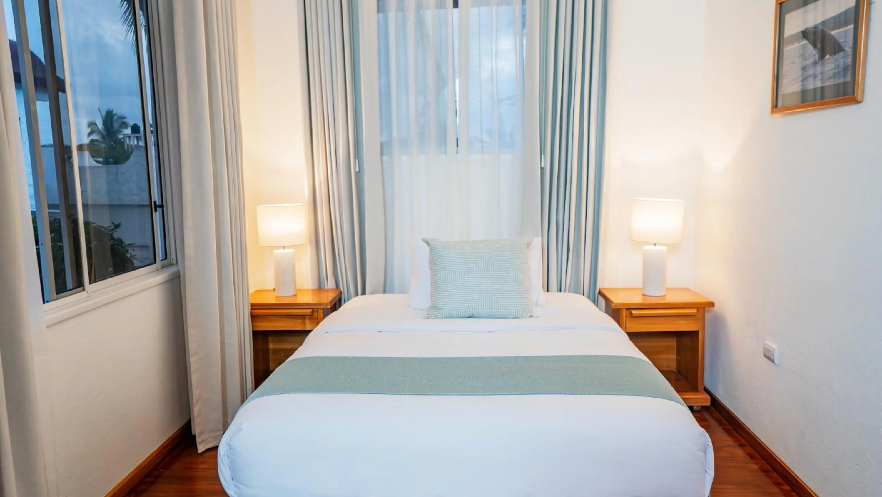 Bed in Hotel Angermeyer Waterfront Inn