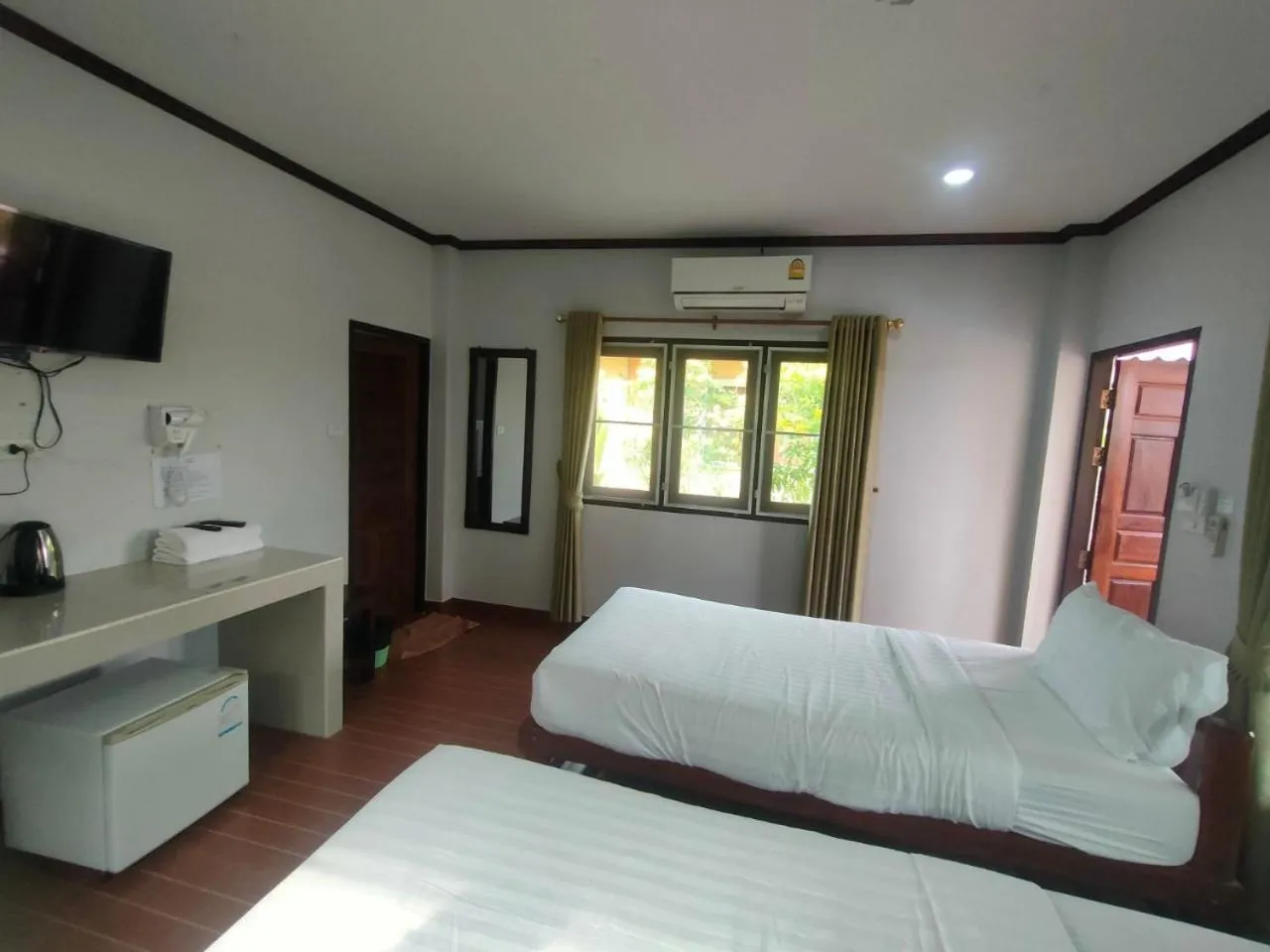 Bed in Chatchawan Resort