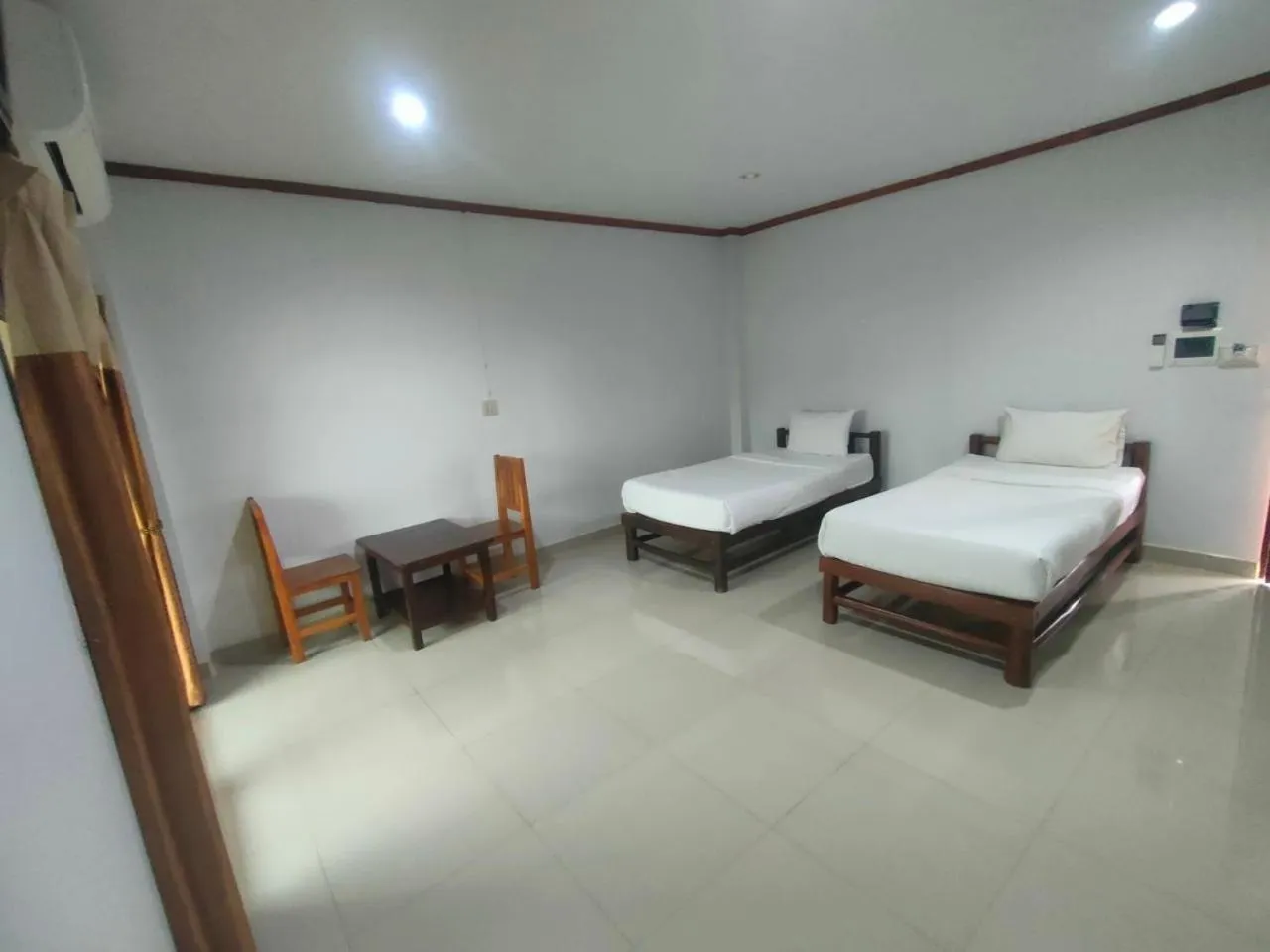 Bed in Chatchawan Resort
