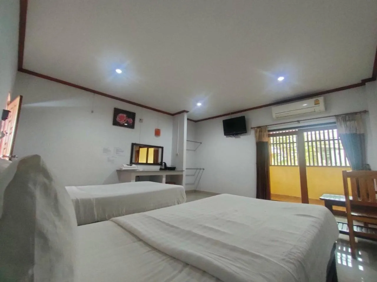 Bed in Chatchawan Resort