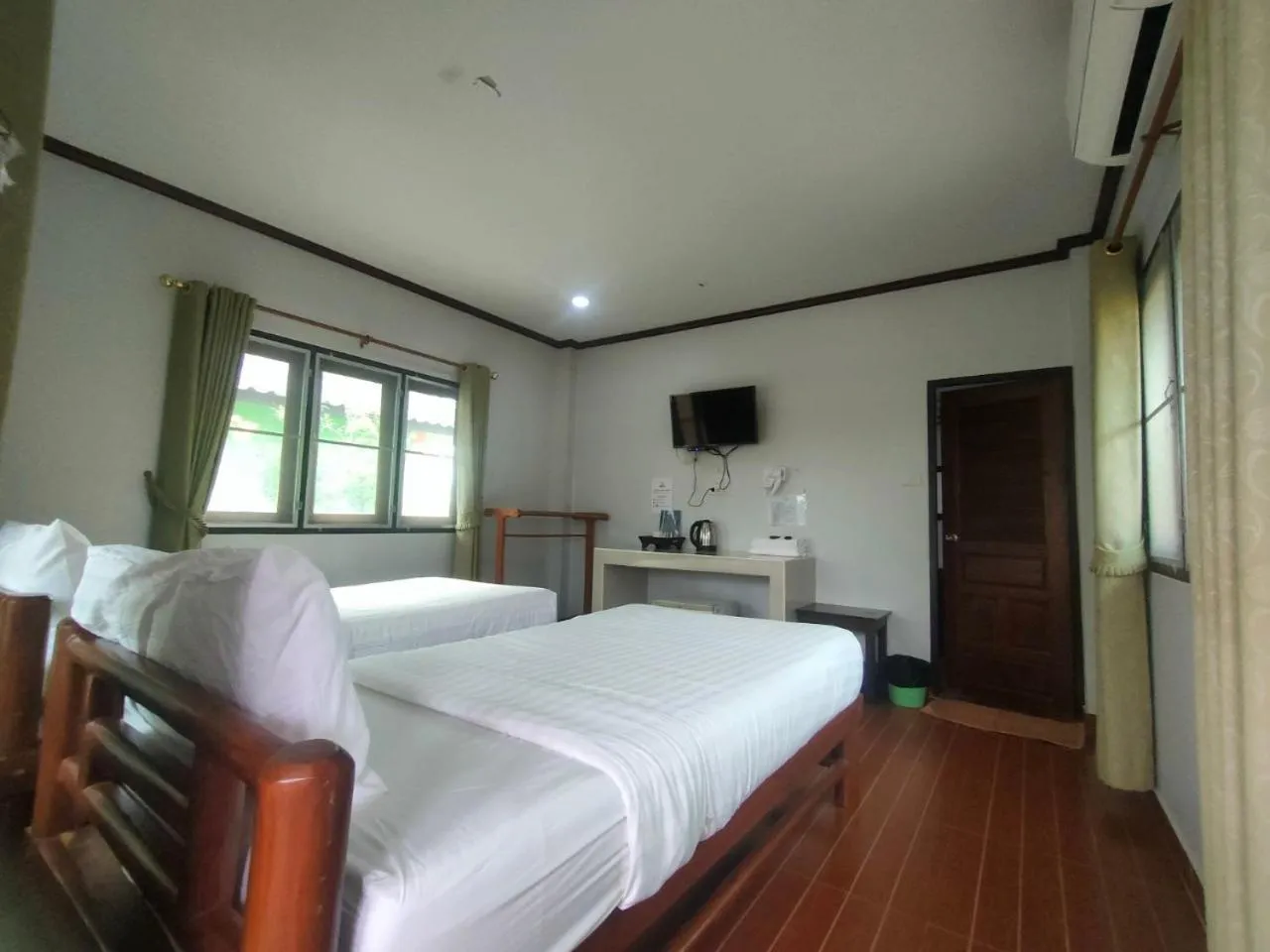 Bed in Chatchawan Resort