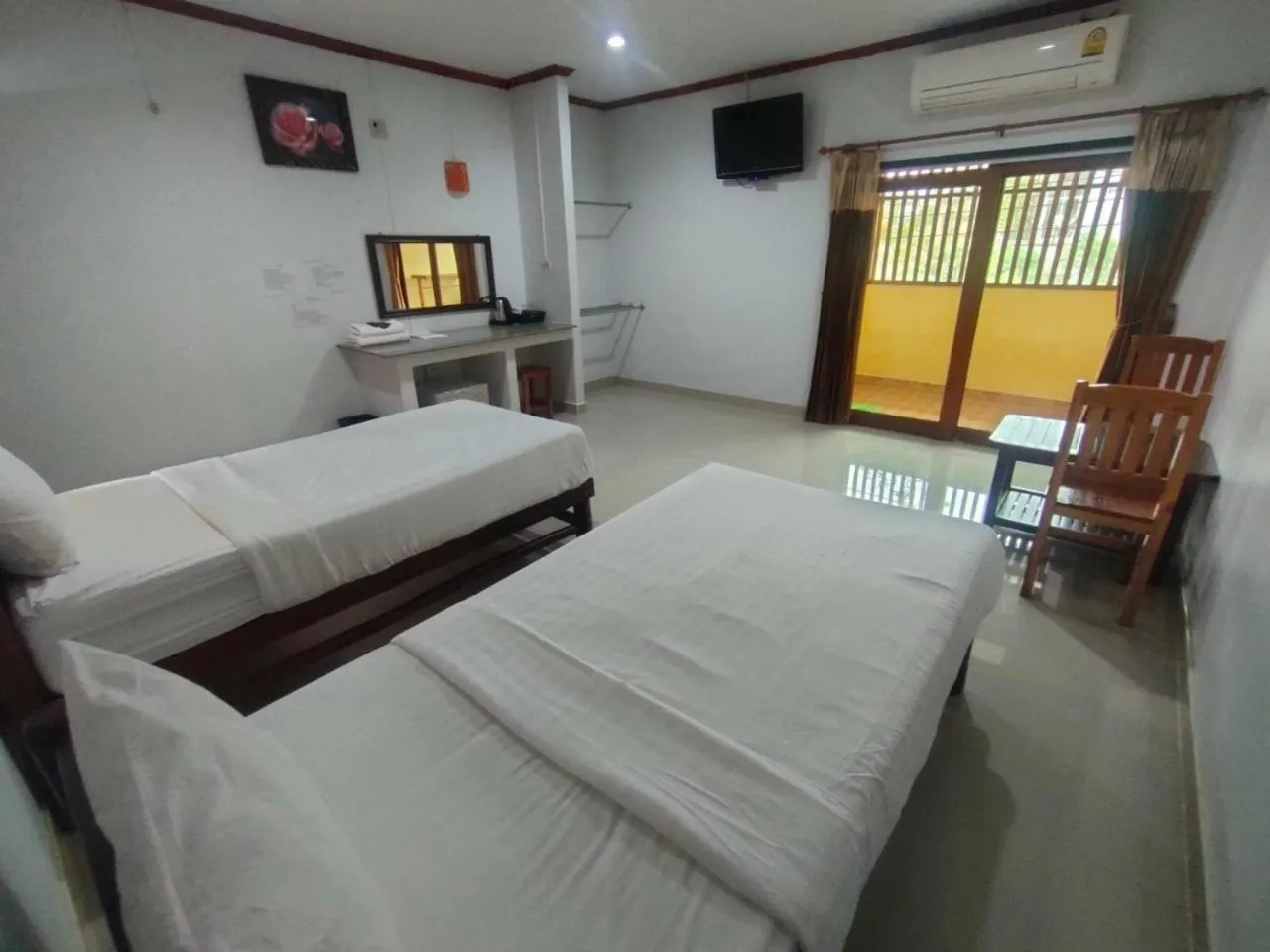 Bed in Chatchawan Resort
