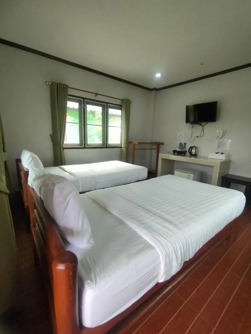 Bed in Chatchawan Resort