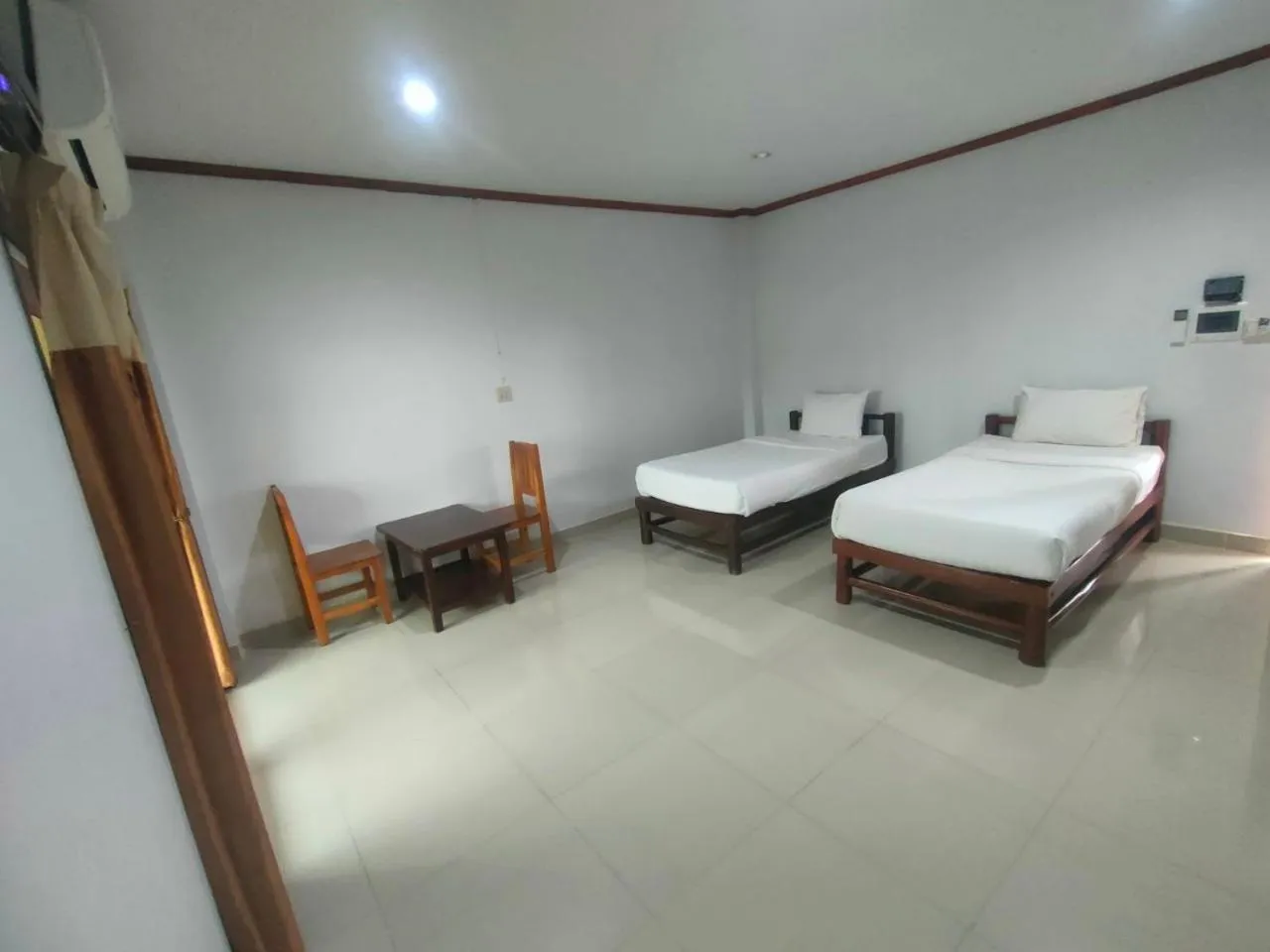 Bed in Chatchawan Resort