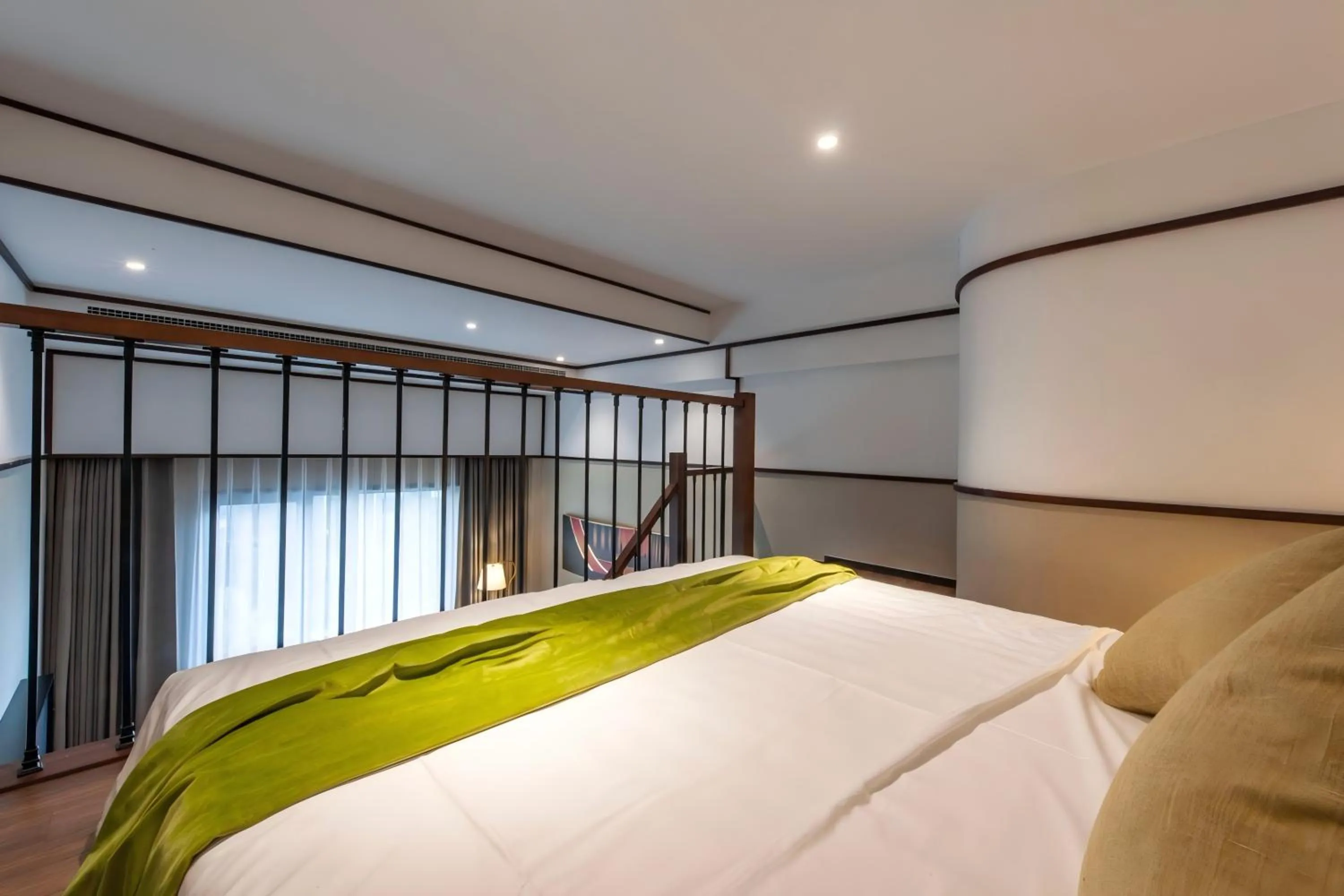Bed in SSAW Boutique Hotel Shanghai Huangpu River