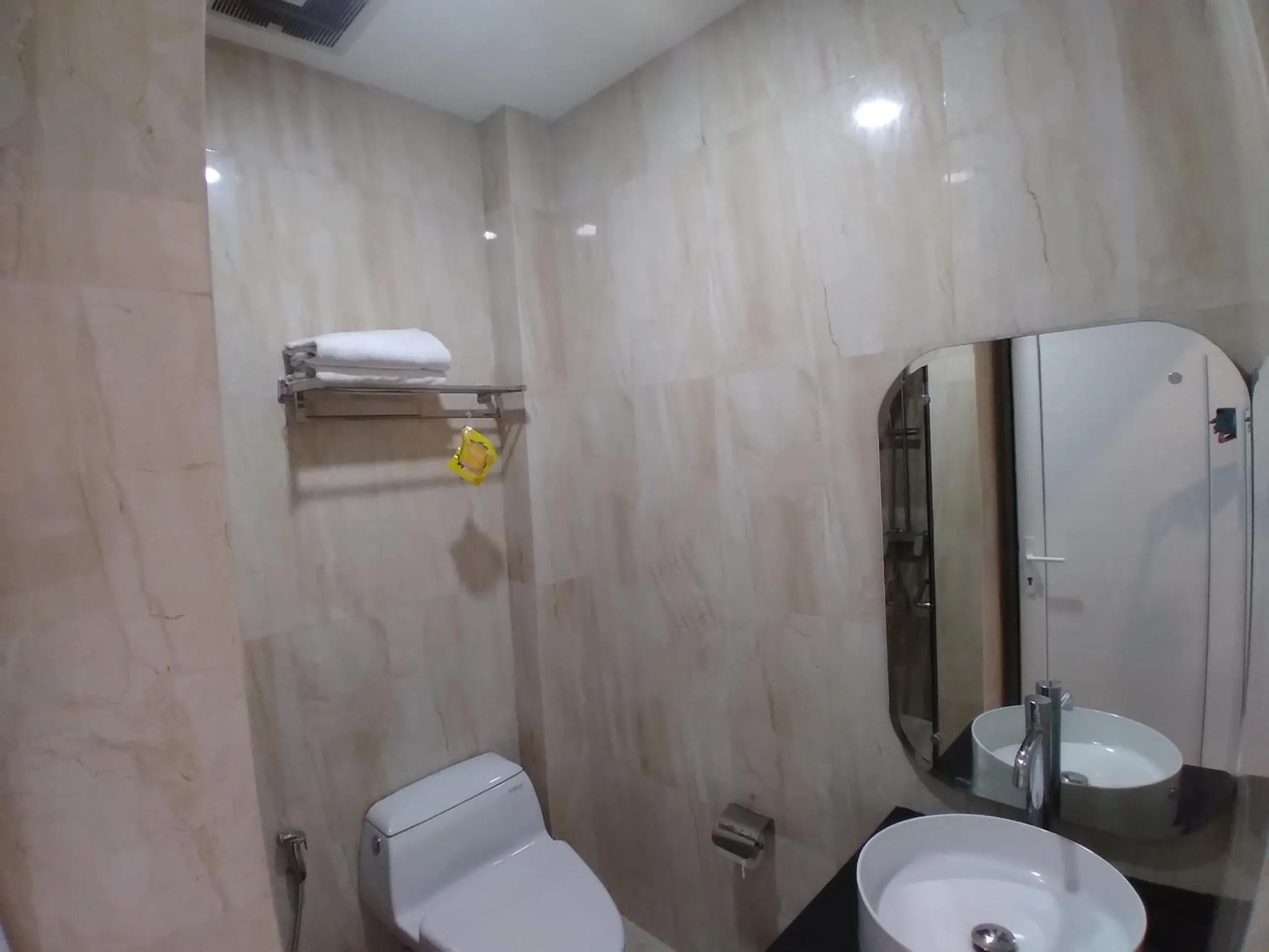 Bathroom in PURNAMA BALIGE HOTEL