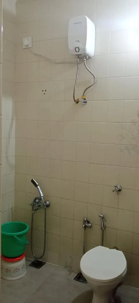 Toilet in Elis Hospitality Service Parth Bungalow