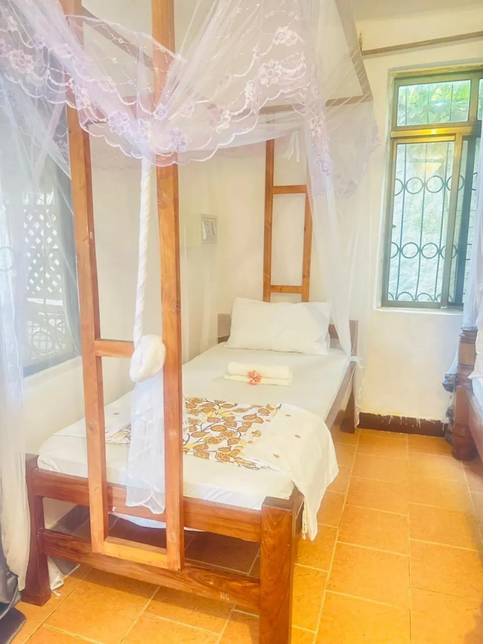 Bed in Sipano Beach Lodge Kiwengwa