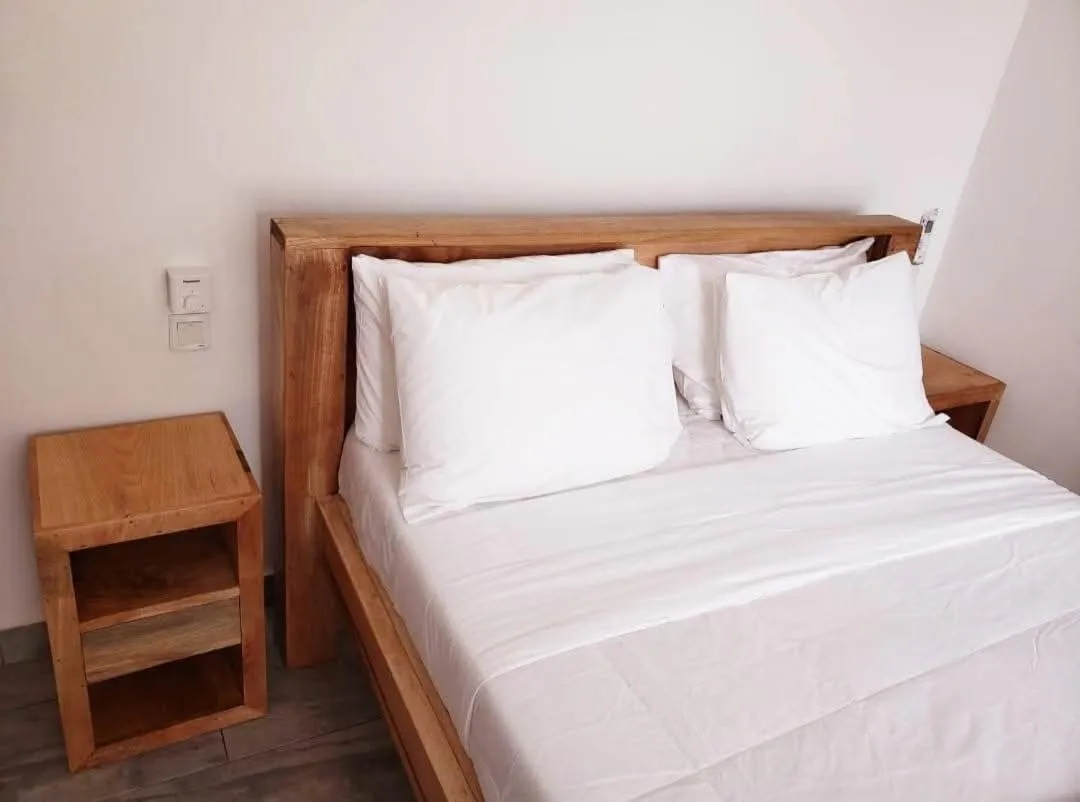 Bed in Sipano Beach Lodge Kiwengwa