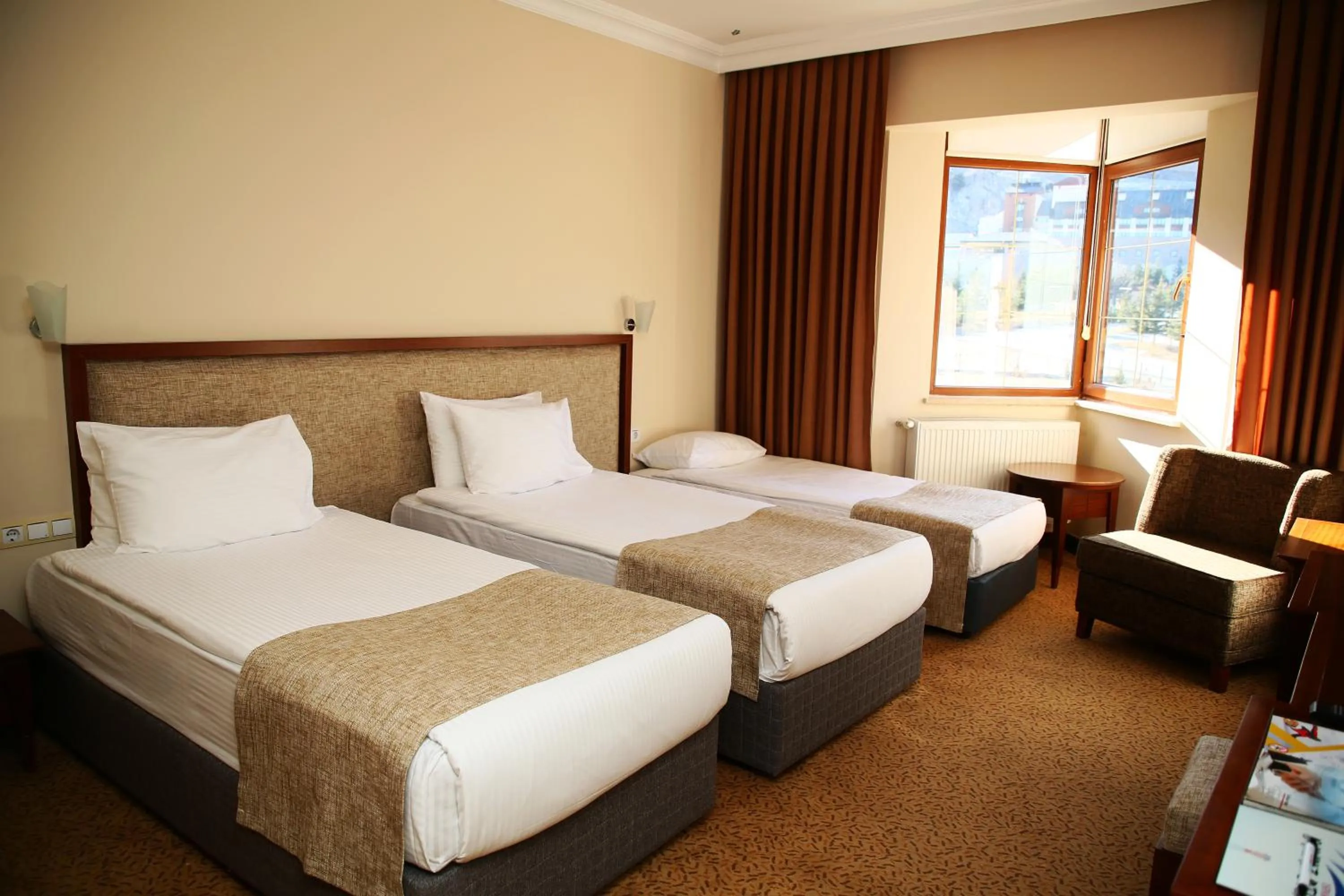 Bed in West Davraz Hotel