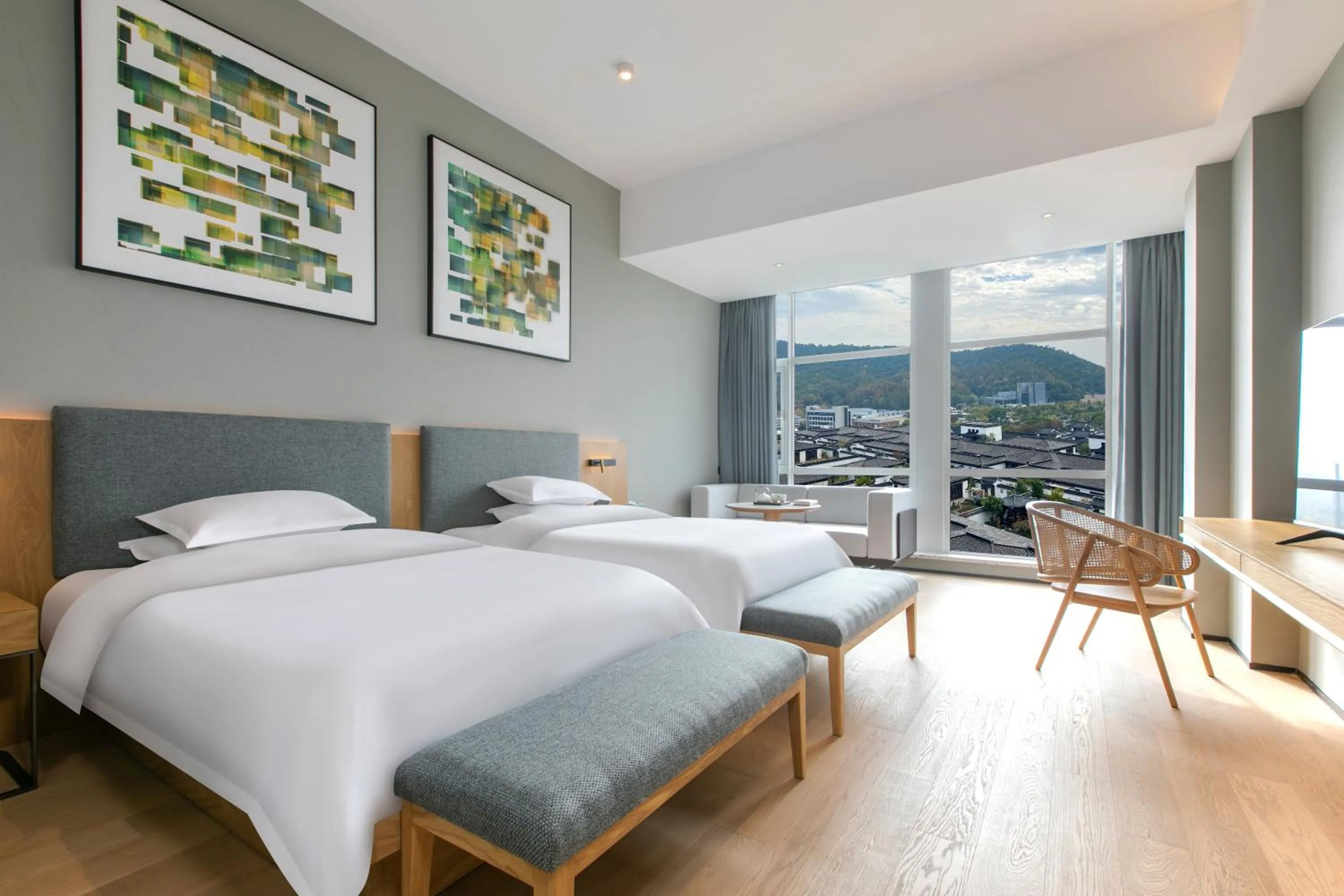 Photo of the whole room, Bed in SSAW Boutique Hotel ZHIJIANG IMPRESSION