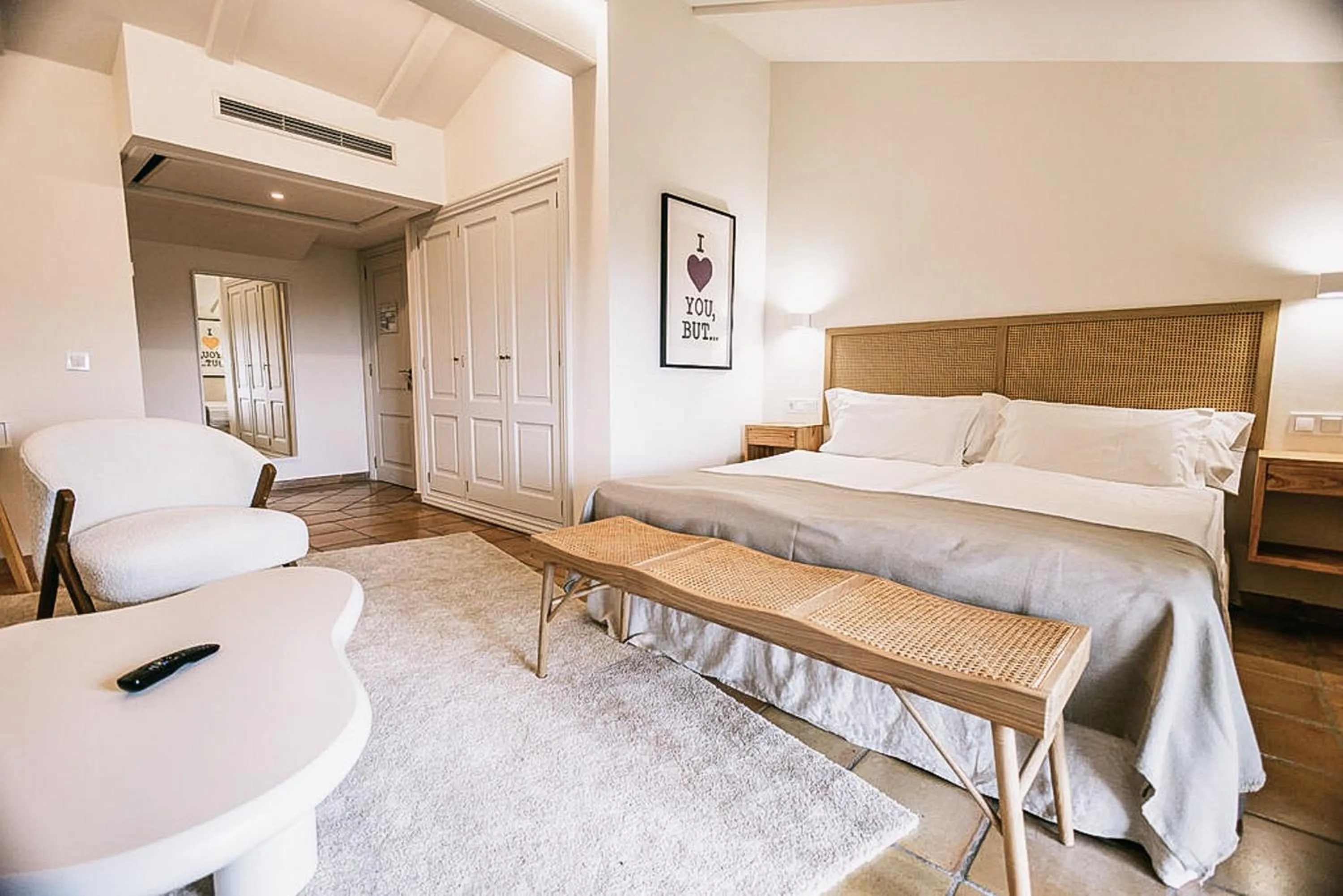 Bed in Posada del Marqués I A Slow Design Hotel