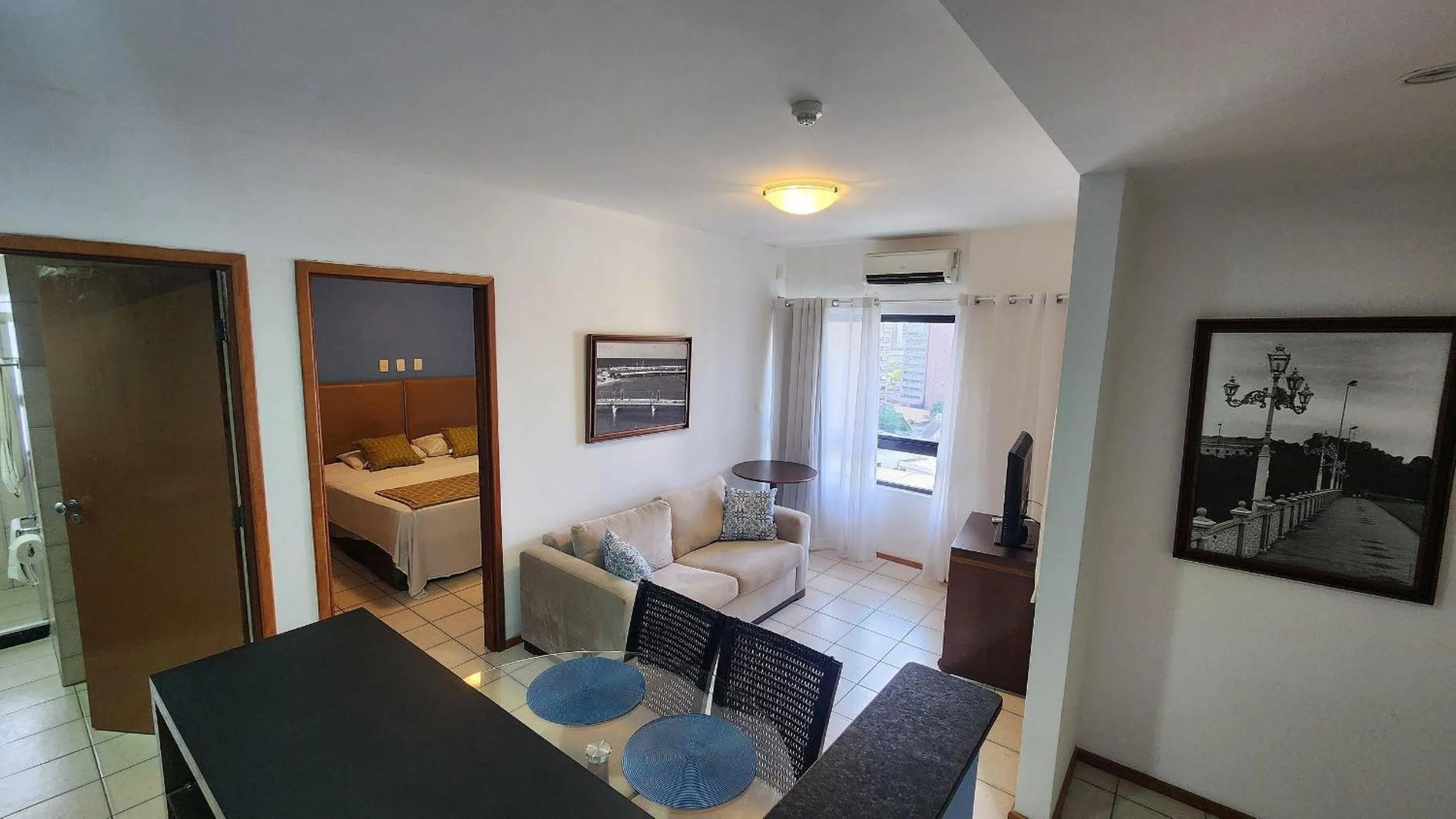 Living room, Bed in Flat no Condomínio Metrópolis - Ilha do Leite