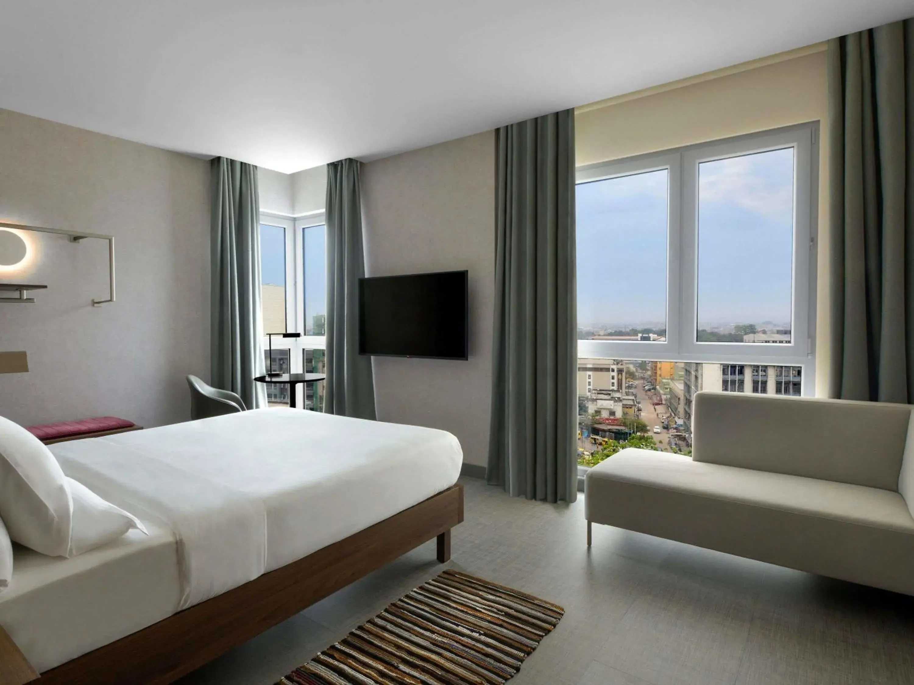 Executive Room with Double Bed and Sofa in Novotel Kinshasa La Gombe Executive Room with Double Bed and Sofa in Novotel Kinshasa La Gombe