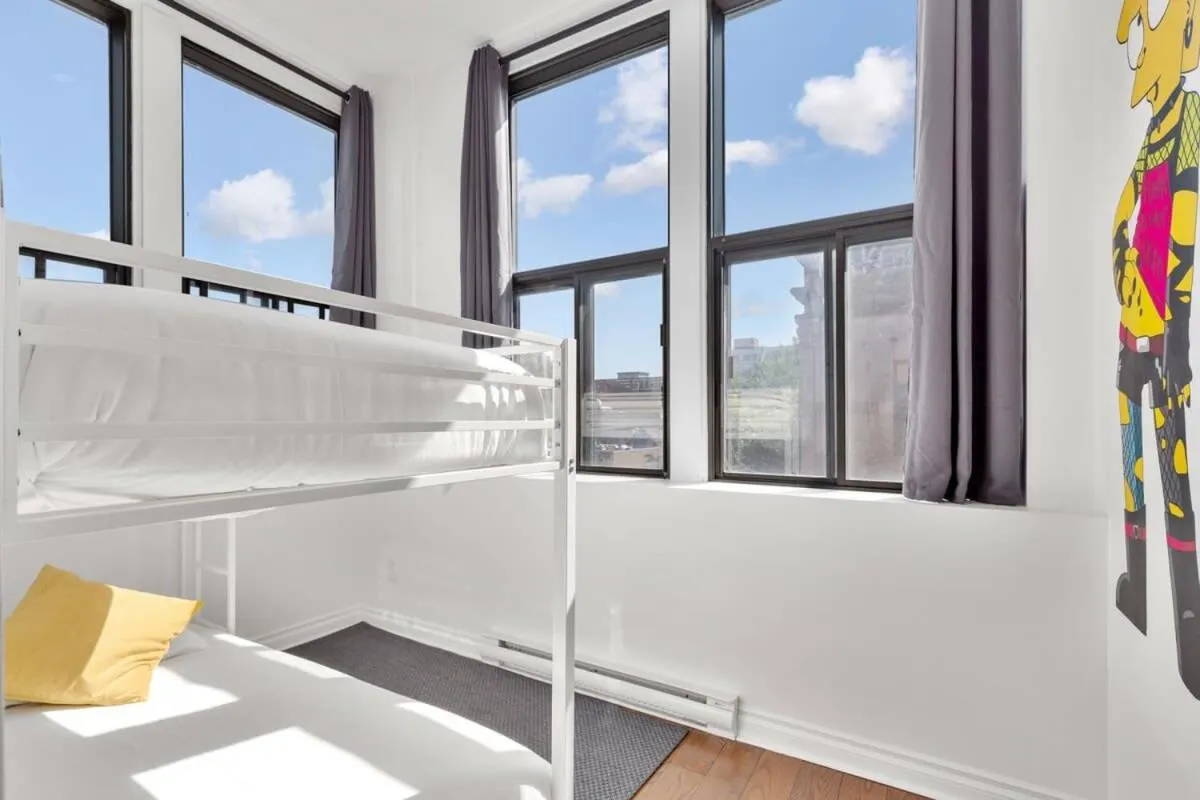 Bed in M11 The Simpsons Suite 3BR in The Heart of MTL