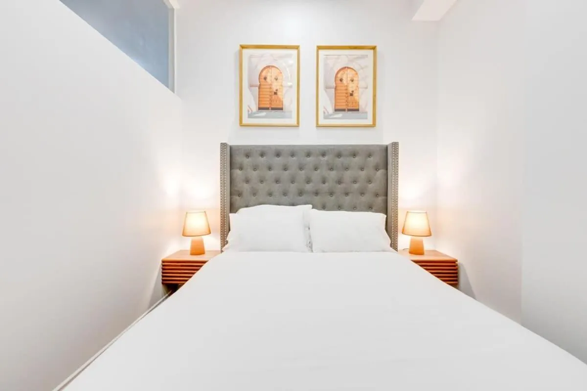 Bed in M11 Stylish Modern 3BR in Prime Location