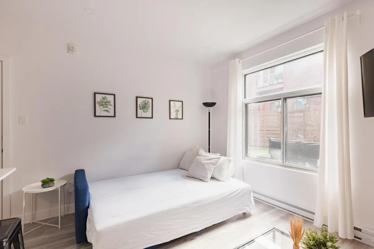Bed in M11 Luxury 2BR Sofa Bed in the Heart of PlateauMile-End
