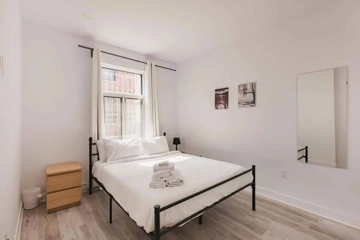 Bed in M11 Luxury 2BR Sofa Bed in the Heart of PlateauMile-End