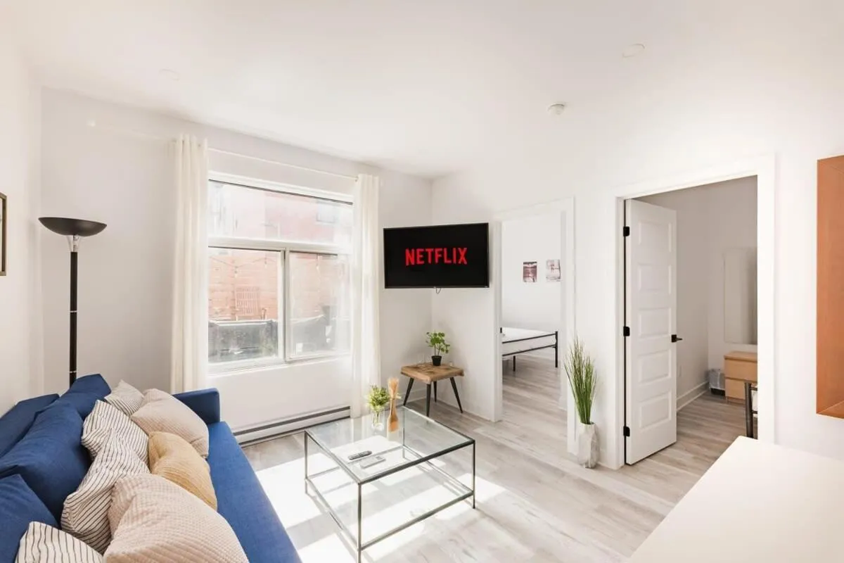 Bed in M11 Luxury 2BR Sofa Bed in the Heart of PlateauMile-End