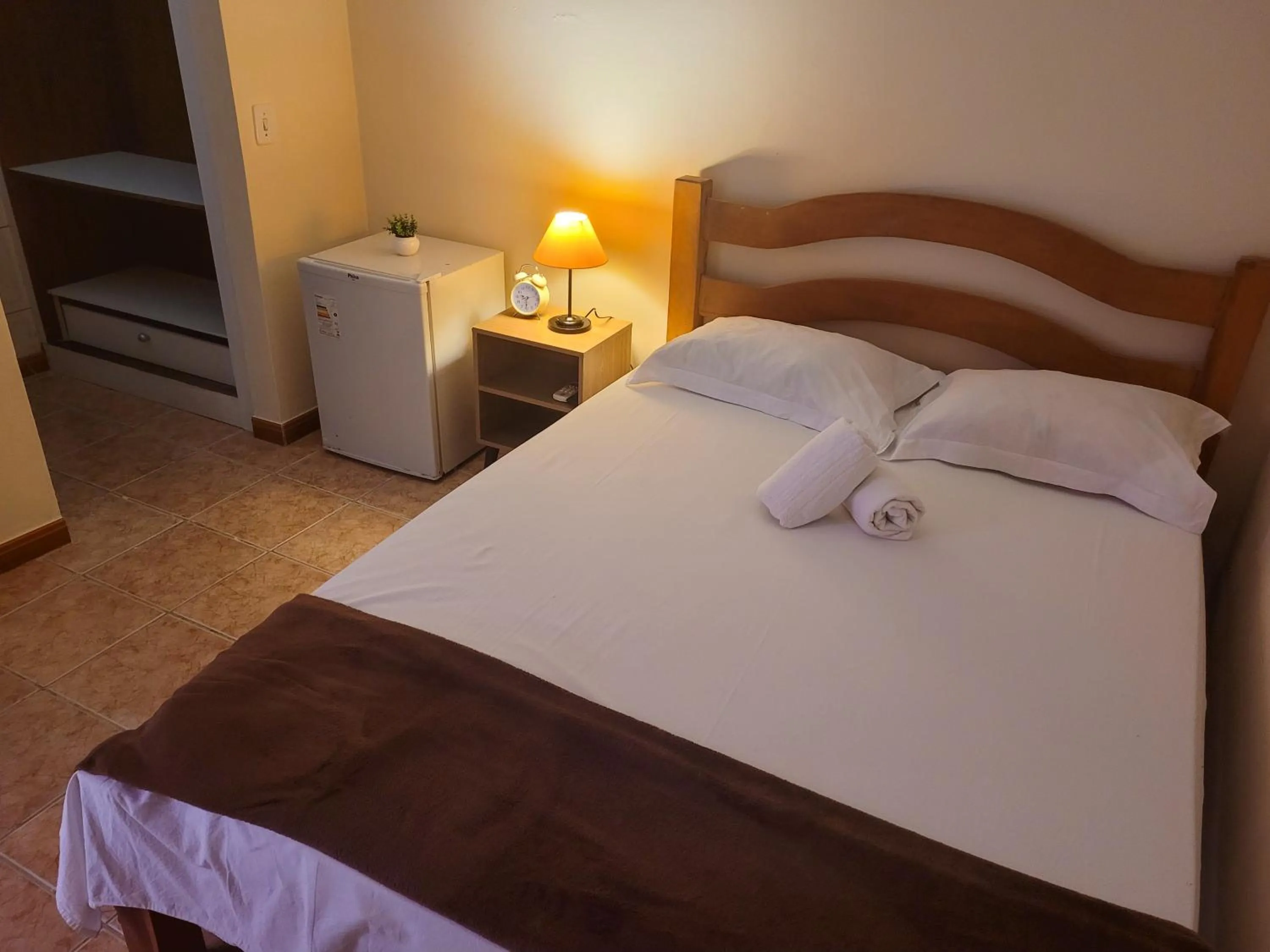 Bed in Pousada Villa Coelho