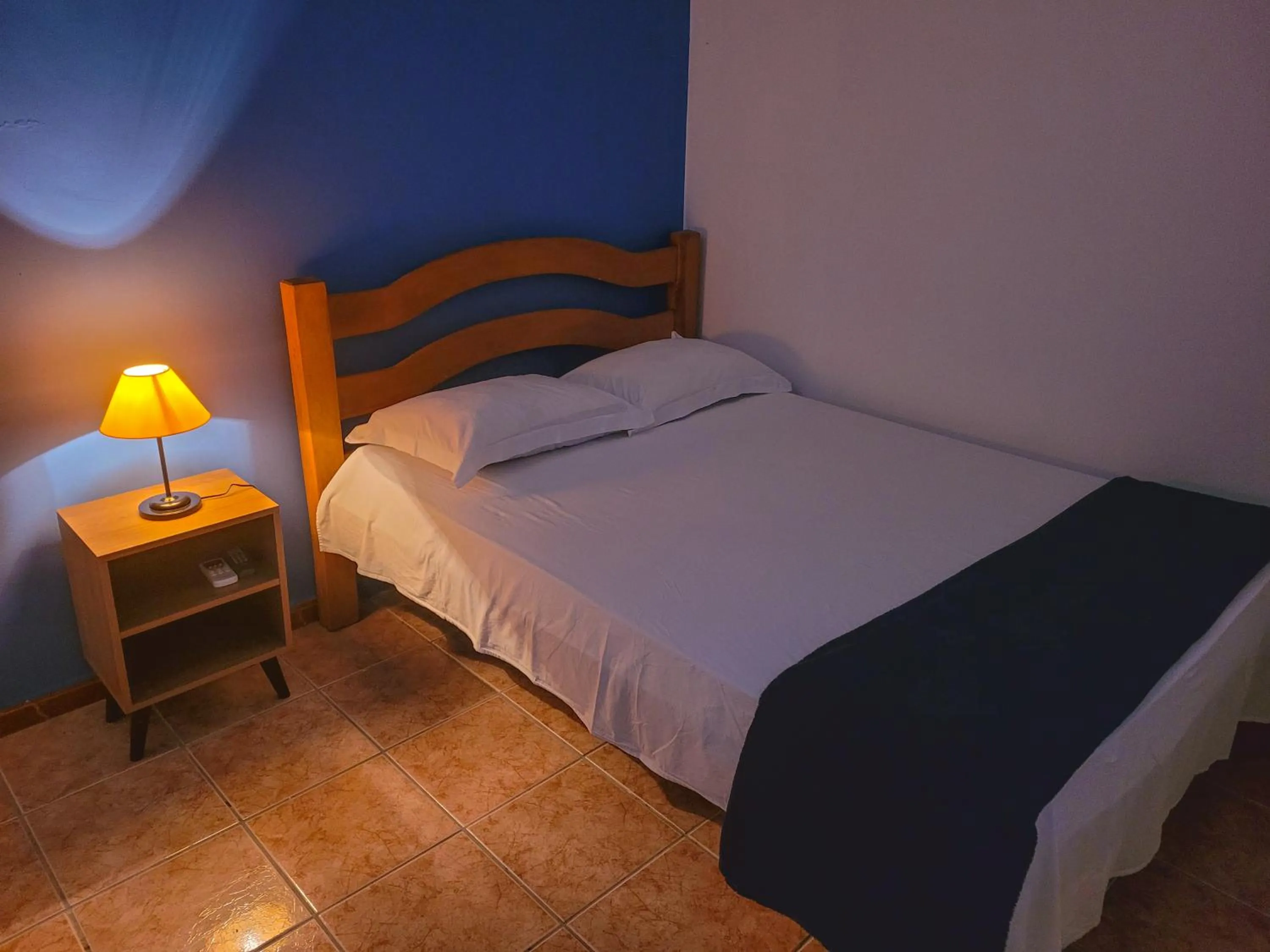 Bed in Pousada Villa Coelho