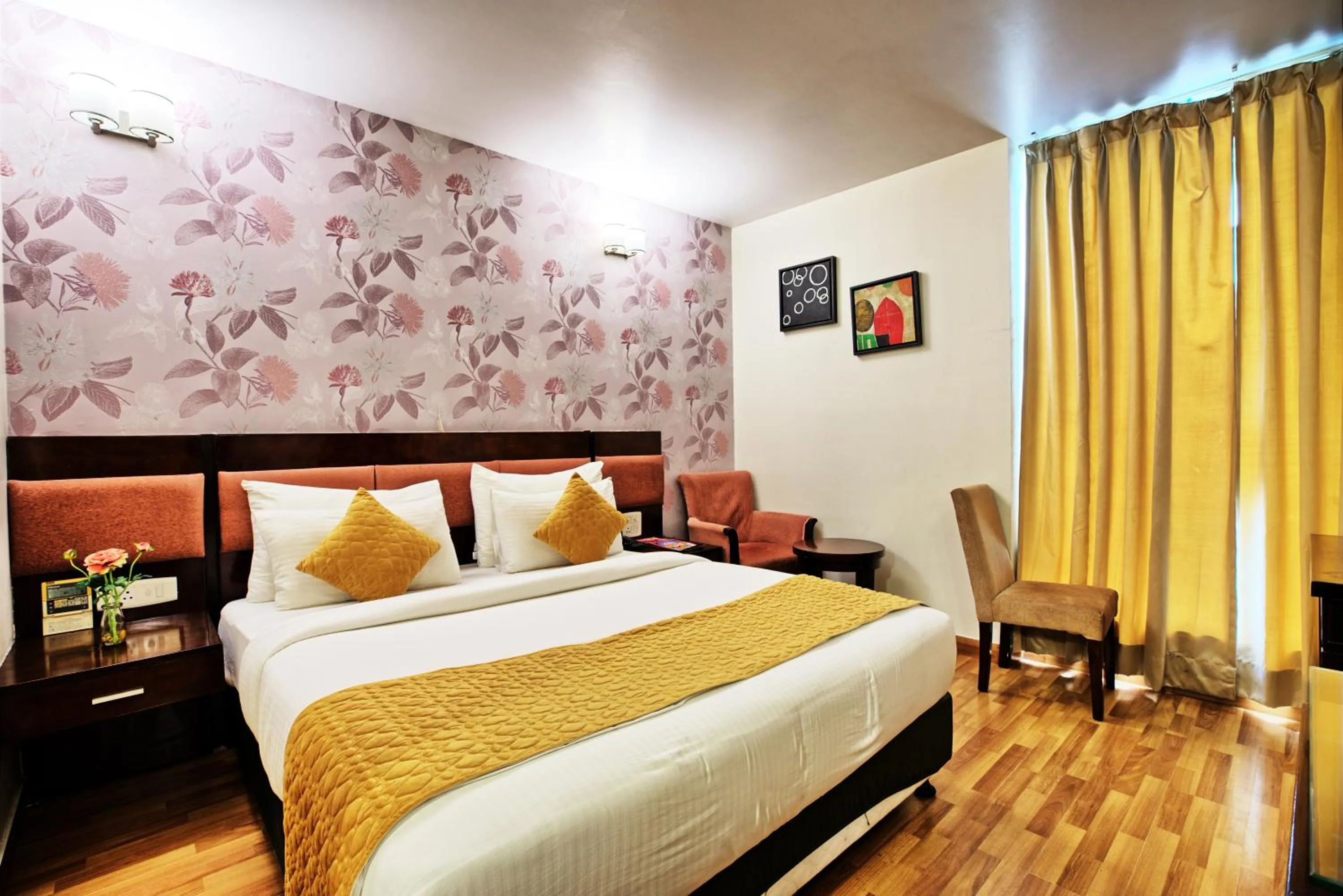 Photo of the whole room, Bed in Rosemallow Hotel New Delhi