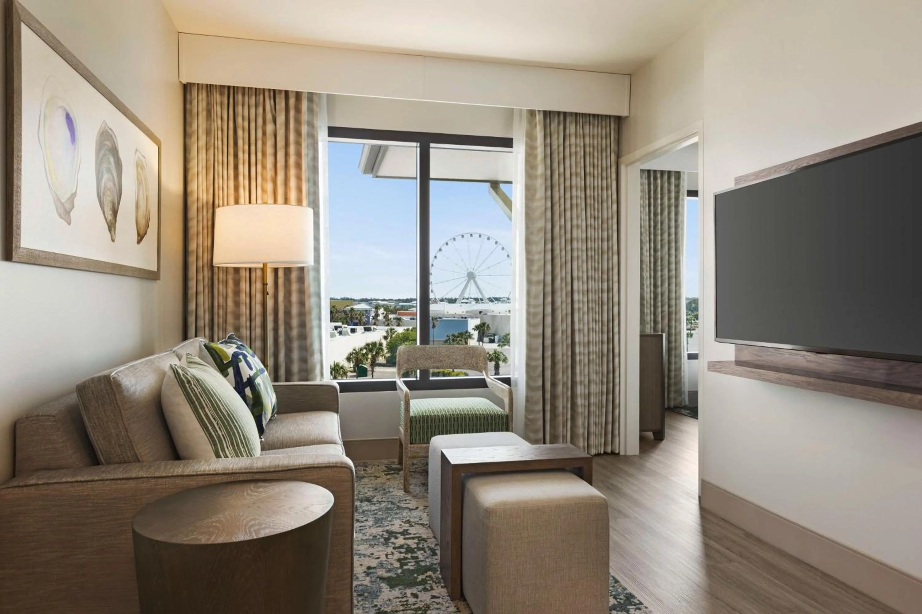 Living room in Embassy Suites By Hilton Panama City Beach Resort