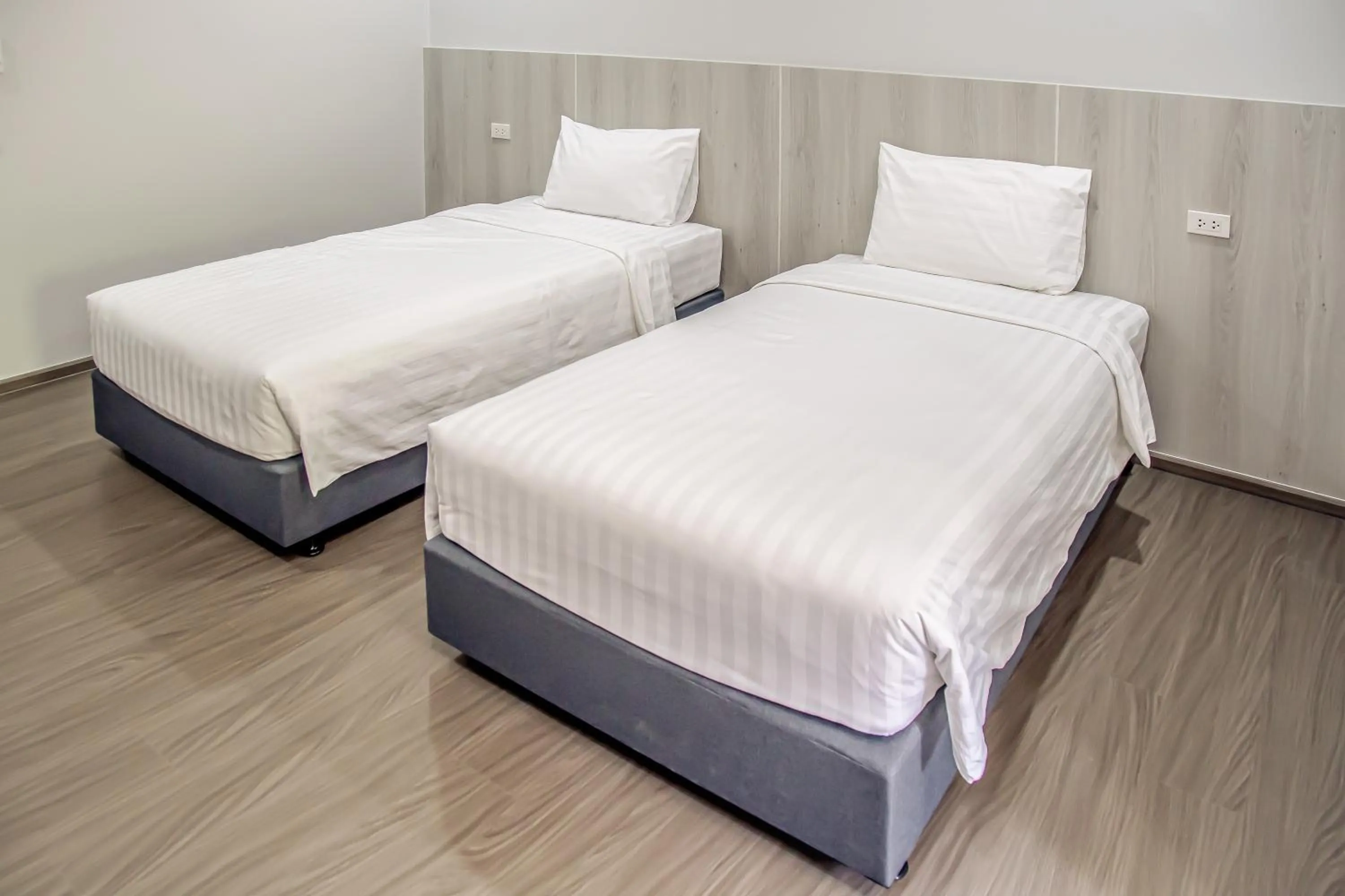 Bed in น่าน ม่วนใจ Nan Muanjai Hotel