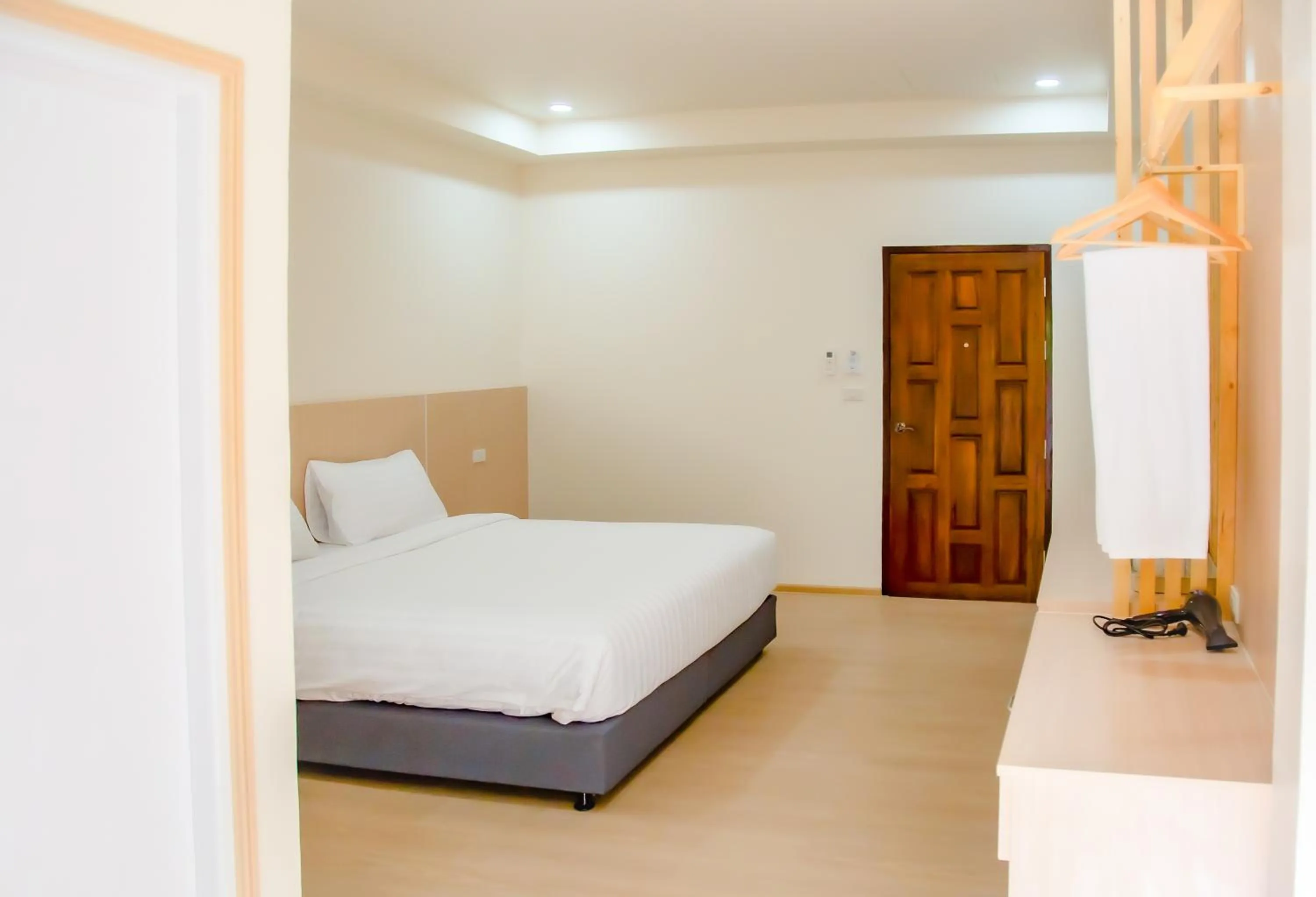 Bedroom, Bed in น่าน ม่วนใจ Nan Muanjai Hotel