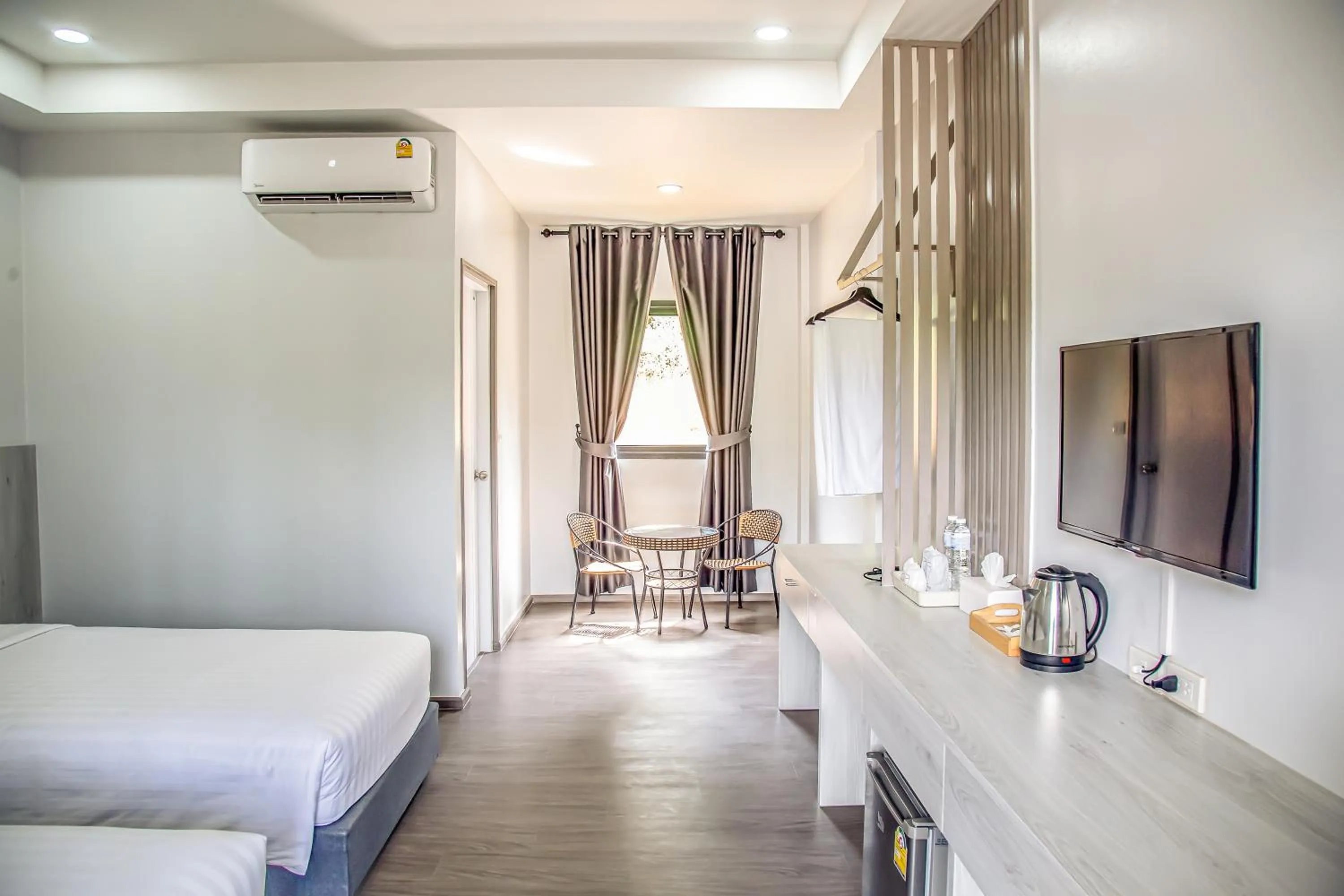 Bed in น่าน ม่วนใจ Nan Muanjai Hotel