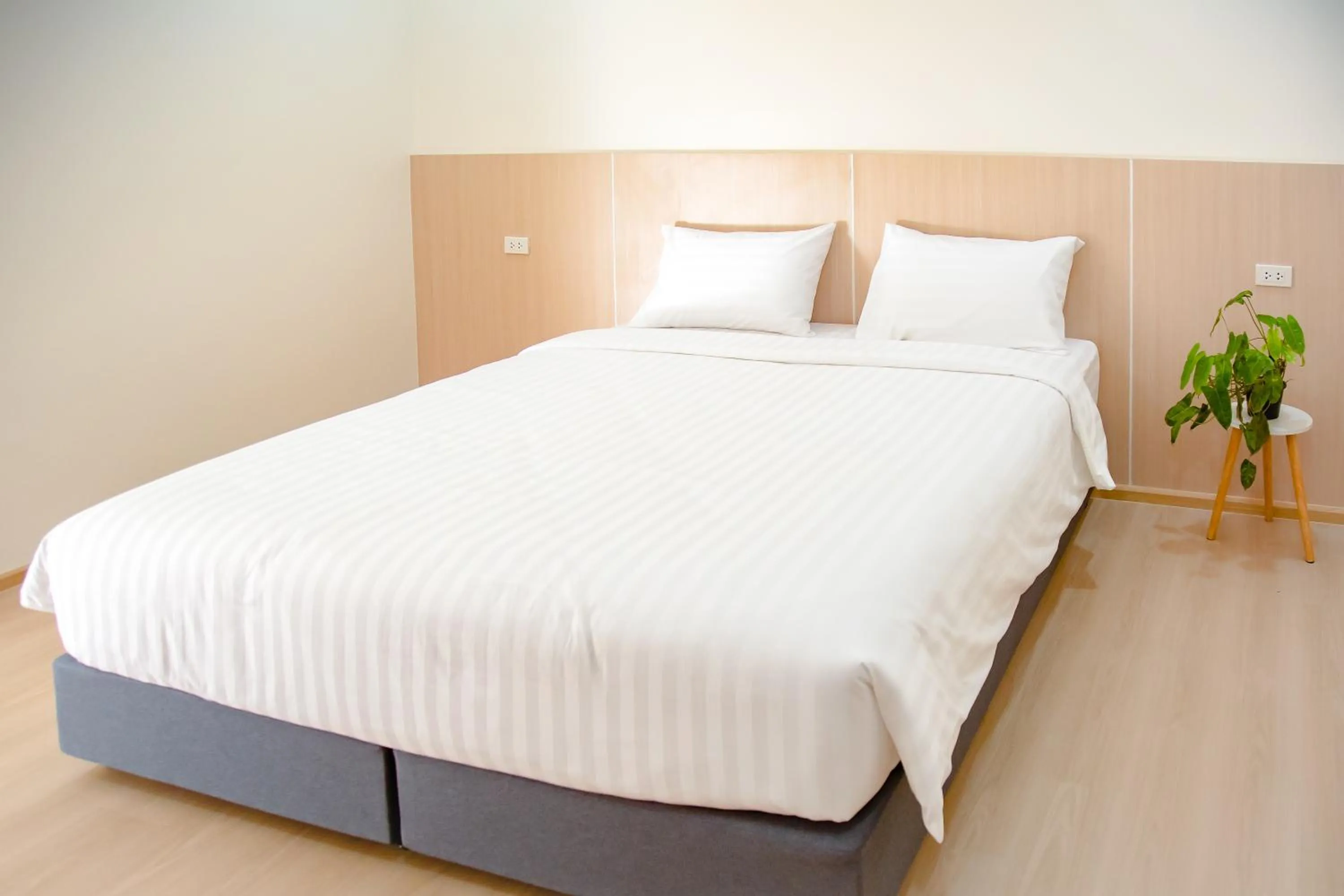 Bedroom, Bed in น่าน ม่วนใจ Nan Muanjai Hotel