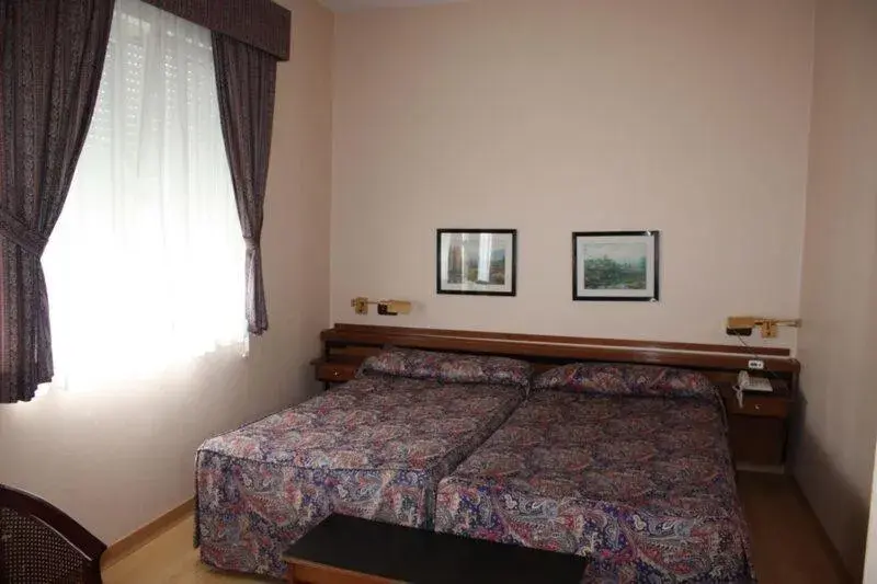 Day, Bed in Hotel Las Sirenas Day, Bed in Hotel Las Sirenas