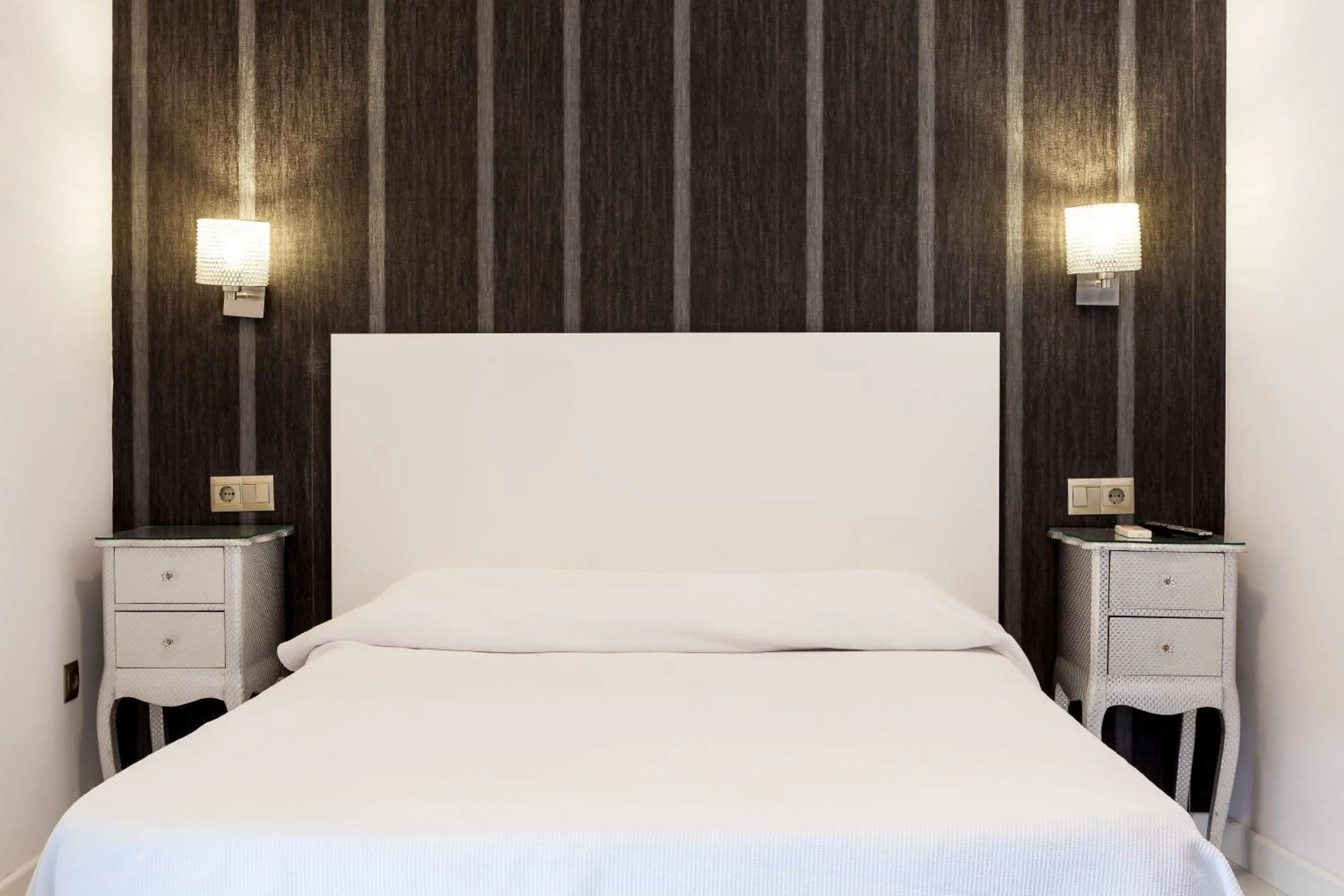 Bed in Apartamentos Abril