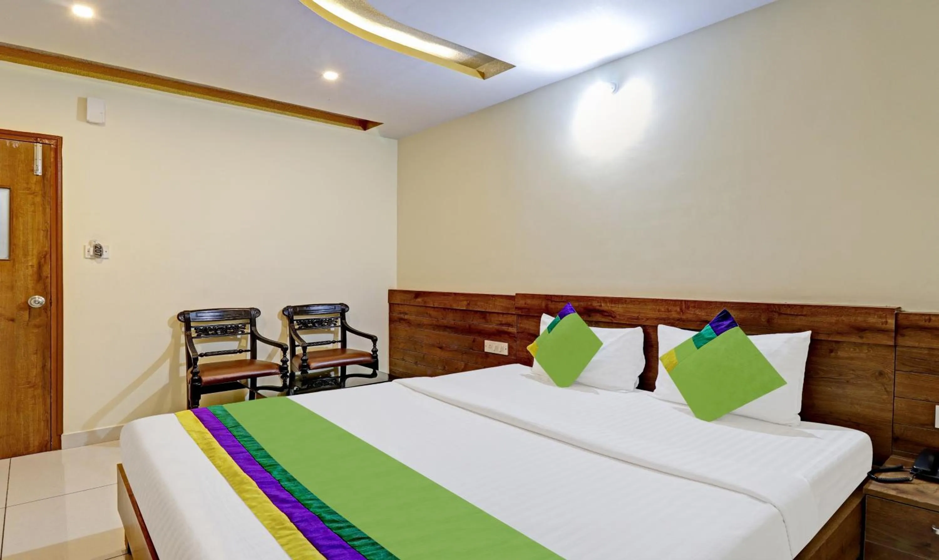 Bedroom, Bed in Treebo Skanda Suites