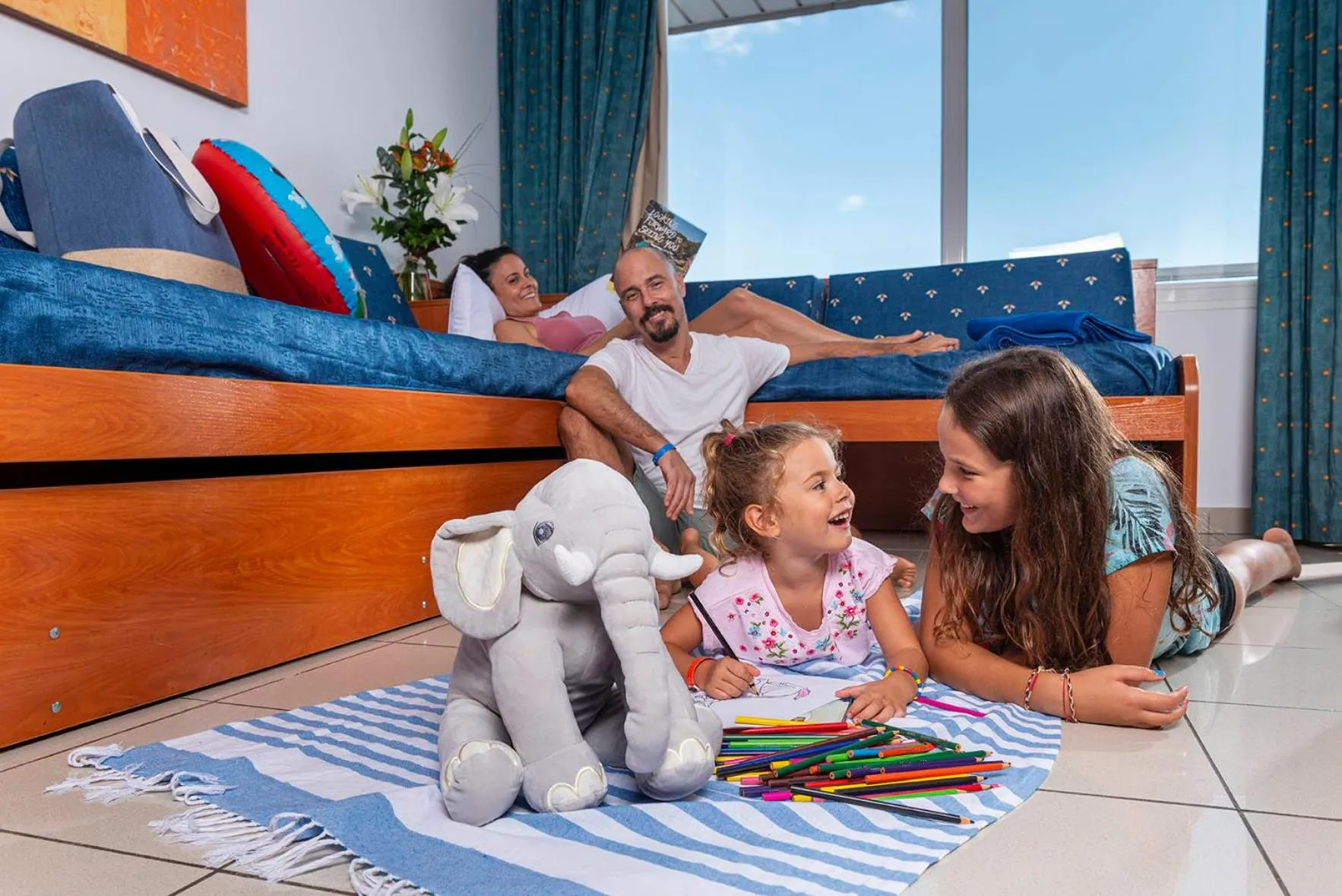 Family in Costa Encantada Resort & Suites