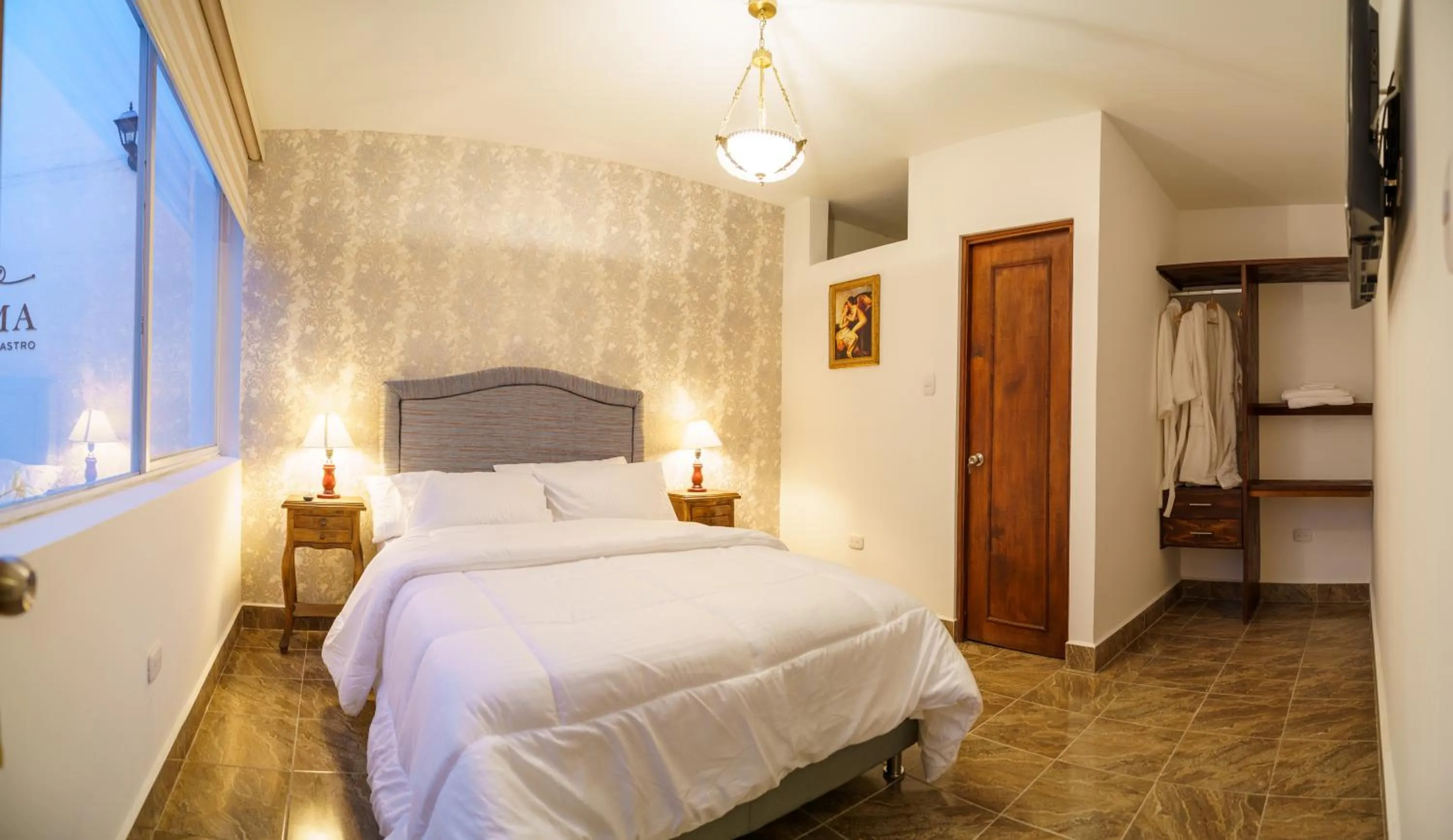 Bed in CASA LOMA HOTEL BOUTIQUE & TERRAZA GASTRO